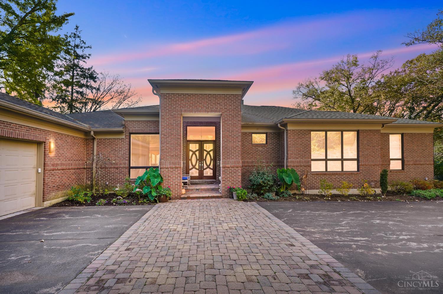 Tucked away down a private drive on Grandin Road lies your private retreat at the Sunset Treehouse. This 2006 custom build by Daniels Fine Homes provides four seasons of tranquility and spectacular views of your wooded yard from your private deck and walkout basement. A truly flexible floor plan provides endless possibilities for the house to easily accommodate extra bedrooms, if desired, and a private entrance into a studio/office space. Soaring ceilings and quality finishes are the hallmark of this lovingly maintained home.