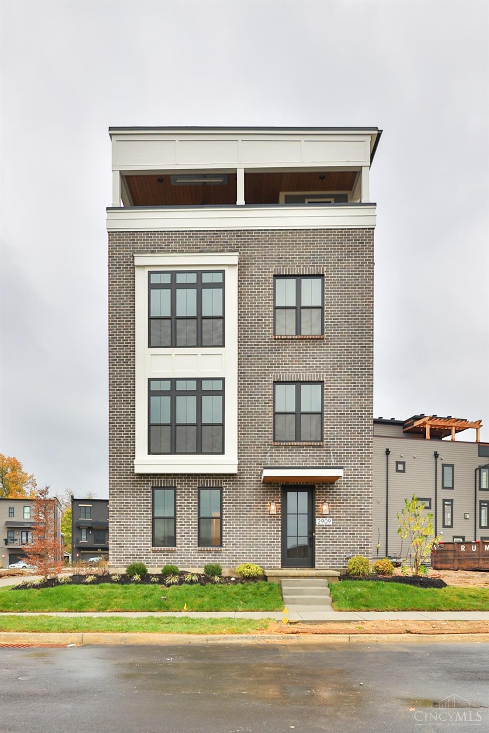 Rooftop living at its best. Custom built by WP Land Company, this gorgeous home has it all. Large rooftop patio spanning the entire 4th floor with an elevator to get you there. 15-year tax abatement, Steps away from downtown Oakley!  Located in the community hosting Homearama 2025. Lot #14.