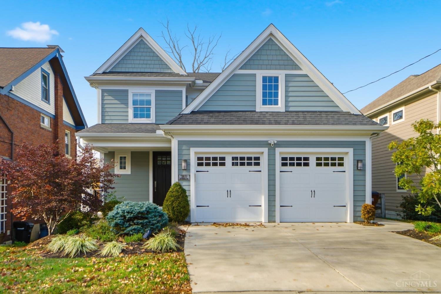 Tax-abated until 2032! Welcome to 3633 Stettinius Ave, a stunning 5 bedroom, 3.5 bath custom-built home in Home Sweet Hyde Park. The open-concept first floor features a gourmet kitchen with granite countertops, a spacious island, abundant wood cabinetry, stainless steel appliances, and a large dining area highlighted by a beautiful chandelier. Hardwood floors flow throughout, with sliding doors leading to a back balcony, plus a powder room and mudroom with a planning desk. The lower level offers a private bedroom, full bath, wet bar, and walkout to the back patio perfect for guests or entertaining. Upstairs, enjoy second-floor laundry, spacious bedrooms, and a versatile great room for an office or playroom. The primary suite includes wall-to-wall carpet, walk-in closet, and a luxurious bath with granite double vanity and walk-in shower. All just around the corner from Hyde Park Square's shops and restaurants and the Wasson Way Trail!