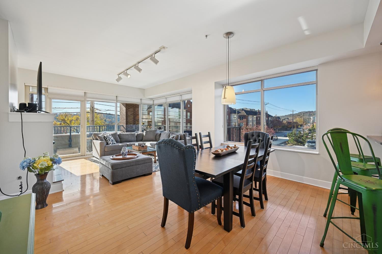 Beautiful Sun Drenched, Waterfront, Two Bedroom, Two Bath RIVERWALK Boutique Mid-Rise Condominium with Window Walls Capturing River, Park and Hillside Views. This Luxury Condo Residence Features a Waterfront Balcony and Bright, Well-Appointed Chic Living Spaces for the Most Discriminating Lifestyle, Featuring Stainless Steel Appliance Package, In-Unit Laundry, and Two Parking Spaces. Secured Intercom Building with Common Library Event Space, Fitness Center, Elevator and Garage, and Surface Parking. Close Proximity to the City, Walnut Hills, Hyde Park, ColumbiaTusculum and the Famed East End Dining and Entertainment District.