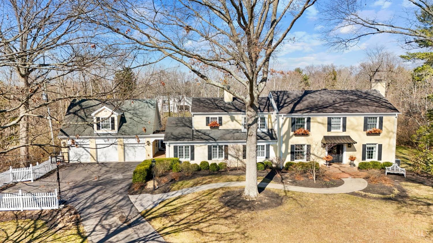 Highest and best offers by 5pm, 3/7/26. Will respond by 12pm on 3/8/26. Welcome to 8340 Arapaho Lane, nestled on a quiet cul-de-sac in the heart of Indian Hill- directly across from IH Schools and moments from everything this premier community has to offer. This classic home blends timeless charm with cheerful personality. Thoughtful updates at every turn, including renovated bathrooms and stylish improvements that seamlessly combine comfort with enduring appeal. Designed for both everyday living and entertaining, the backyard is a true retreat. Step outside to a recently added brick patio overlooking a heated, salt-water pool ideal for summer gatherings, weekend relaxation, and making lasting memories. Upstairs, you'll find four spacious bedrooms plus a dedicated office. Above the three-car garage, a separate space provides endless possibilities- guest suite, recreation space, home gym, or creative studio.