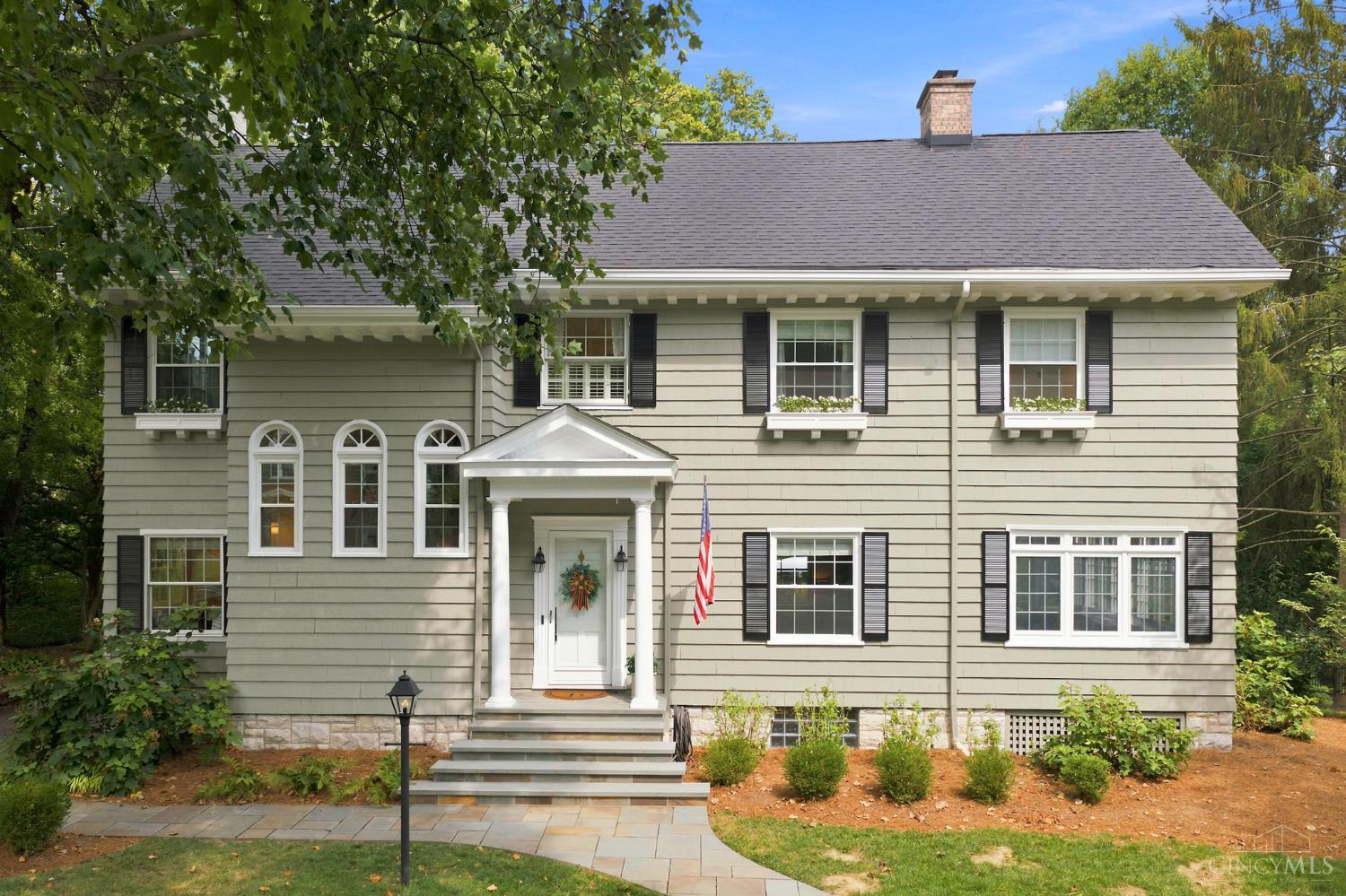 Grand Vista: One of Pleasant Ridge's most coveted streets where homes rarely hit market! This stately 111 year old gem offers nearly 5k finished sq.ft., timeless architecture & elevated modern luxury. Restored hardwood floors, new windows & preserved historic details create a refined backdrop. The updated kitchen has ample cabinetry & luxury appliances, while the large sunroom offers a cozy space with views of the back patio & gorgeous professional landscaping. The primary suite is a true sanctuary with 2 walk in closets, built-ins, double headed shower, soaking tub, double vanity & substantial quartz counters. The formal dining room centering the home is perfect for holiday dinners. Sunlight pours into the sunken family room & wet bar. Formal living room for entertaining. A remodeled 3rd floor bath compliments the flexible guest suite + 3rd floor office. Zoned HVAC, 1st floor laundry, basement w/ gym, 2nd family room, bonus laundry hook ups. Electric in detached garage. A must see!