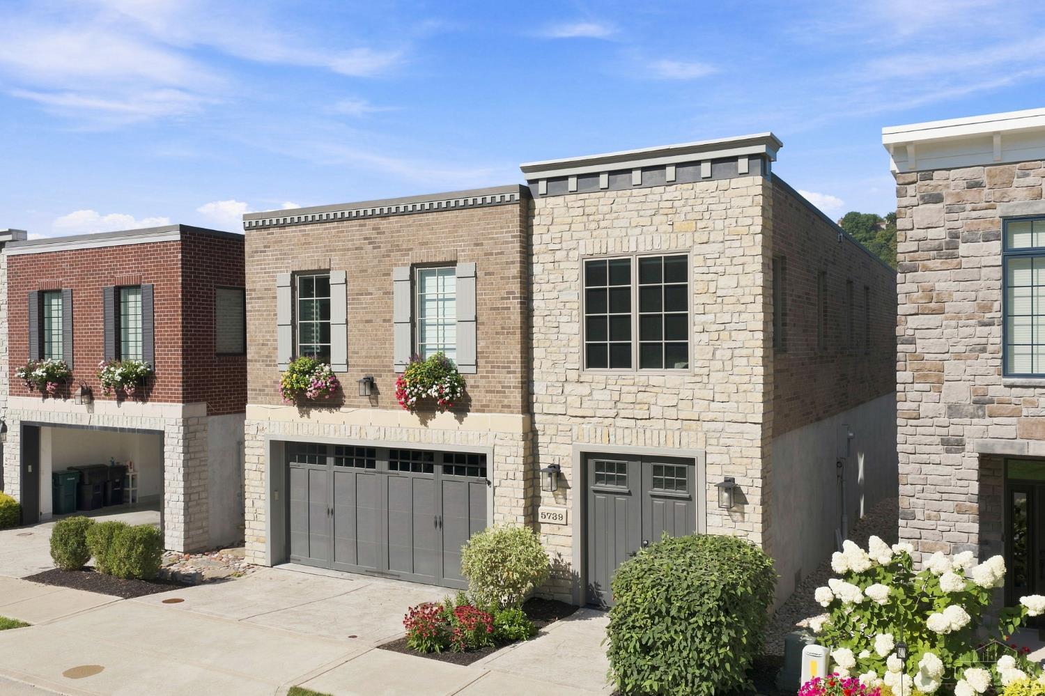 Live as though you are floating above the river where serene water views become part of the design. A beautiful stone facade, stamped concrete drive & grand double-door entry set an elegant tone. Inside, wood floors, custom blinds & an elevator connect each thoughtfully designed level. The open 2nd floor kitchen & living area features a wall of windows + top floor deck, granite counters & a five-burner gas range. The spacious primary suite offers a tray ceiling, spa-like bath with tiled walk in shower, double vanity & generous walk-in closet. All 3 bedrooms offer great space with ample linen & storage space throughout. The expansive 1st floor office opens to the lower level Trex deck overlooking the river & could easily serve as a second family room. An oversized garage adds dedicated storage & workspace, completing this refined riverfront retreat. Why wake up to traffic when you can wake up to the river! Tax abated!