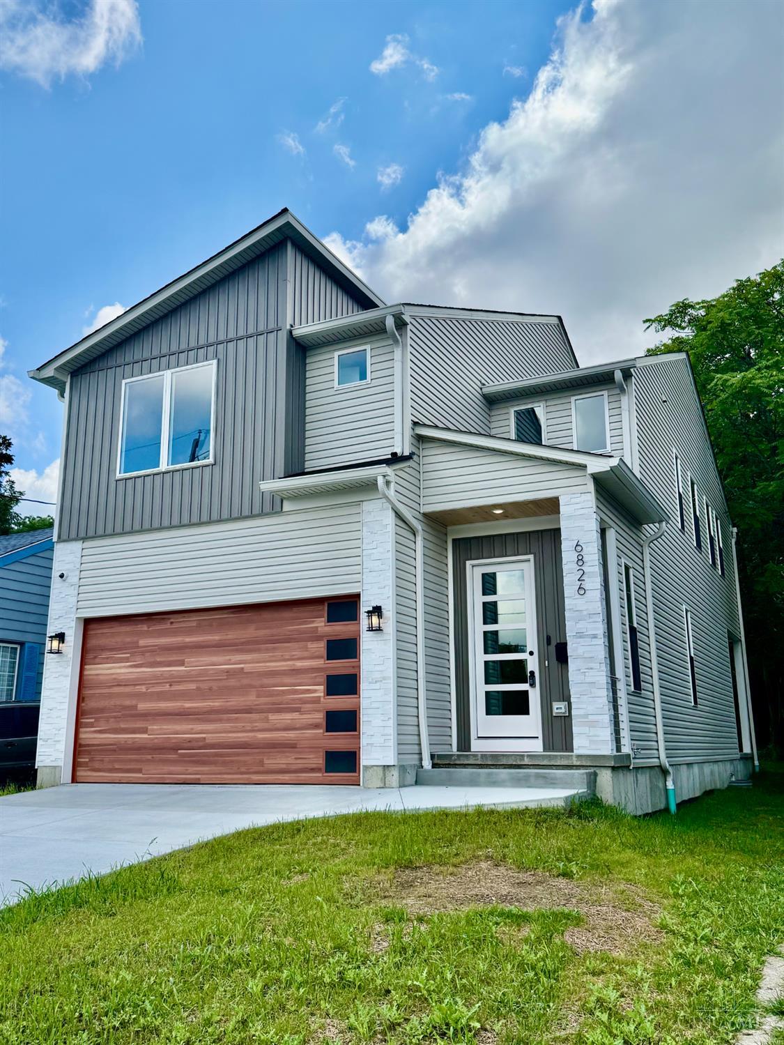 Stunning NEW CONSTRUCTION in Kennedy Heights. LEED Gold certification eligible. Tax abatement eligible. This 5 bed, 3.5 bath home features 10' ceilings on the main level and a show-stopping kitchen with Bosch appliances, quartz countertops, oversized island seating, custom hood, drawer microwave, in-cabinet lighting, and pantry. Open dining area leads to a covered porch perfect for entertaining.  Upstairs, enjoy a spa-inspired owner's suite with double shower, dual quartz vanity, and TWO walk-in closets. Three additional bedrooms, double-vanity hall bath, and spacious laundry room.  Finished lower level (9' ceilings) offers flexible 5th bedroom/office/gym, full bath, wet bar. Gas furnace, tankless water heater. 2 car garage with Electric Car wiring if needed, and exterior video surveillance. Designed for luxury, efficiency, and modern living.  Move-in ready. Agent related to seller, agent has no financial interest. Seller is licensed RA in the State of Ohio.