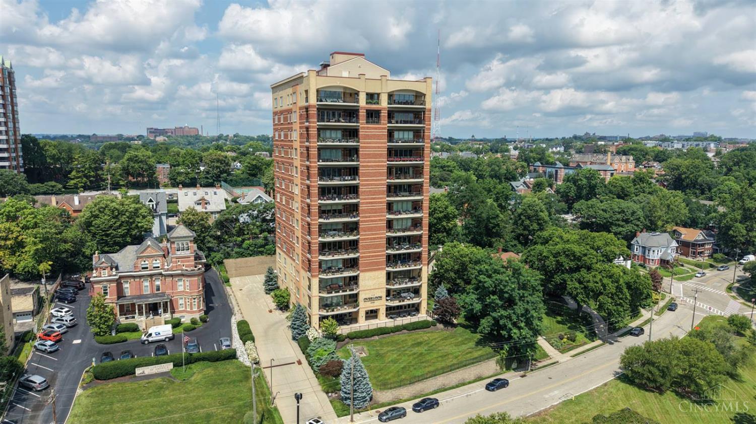 Live a carefree lifestyle in this luxury condominium with magnificent views of the Ohio River & Eden Park. Light-filled rooms, soaring ceilings, hardwood floors, & custom architectural details create an elegant living environment. The open-concept living & dining areas walk out to an expansive 500sf covered terrace, perfect for relaxing or entertaining while enjoying the views. The modern kitchen features custom cabinetry & stainless-steel appliances. The serene primary suite offers a spacious bath & generous closet space. Two additional bedrooms provide flexibility for guests, a home office, or sitting room. Secure building with 2 garage parking spaces plus community amenities including a party room & exercise room. Lovingly maintained & ideally located just minutes from Eden Park, Mt. Adams, the Woodburn Avenue District, & only 5 minutes to downtown Cincinnati. Seller prefers a quick closing with occupancy through 10/31. No escalation clauses. Offers remain open for 48hrs.