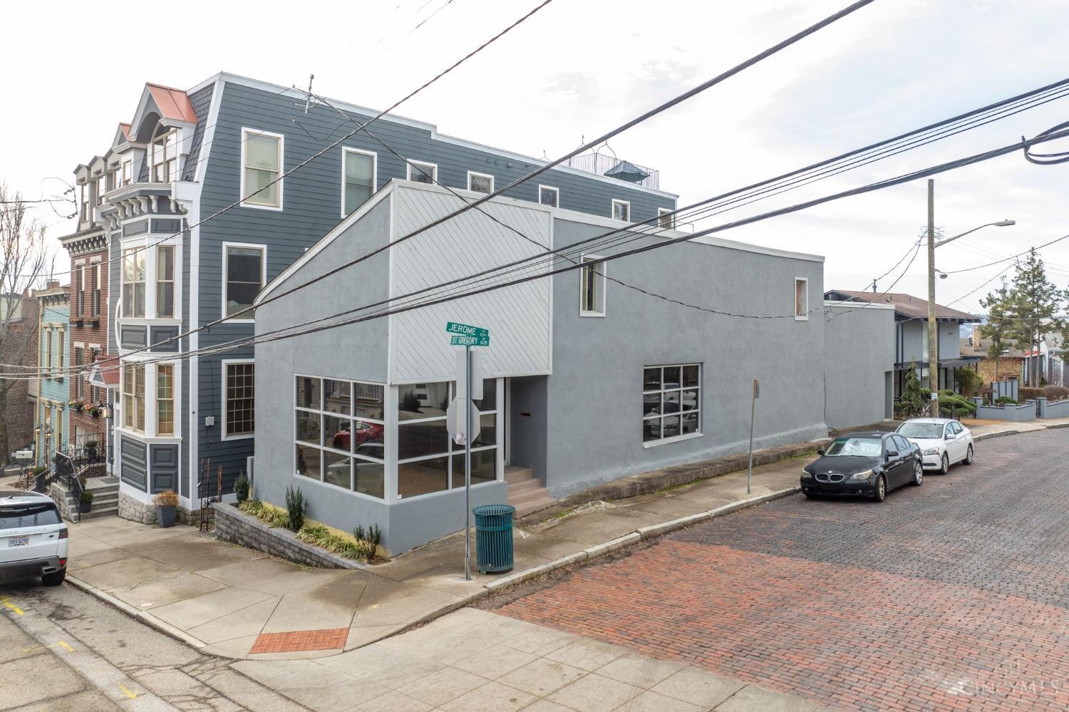 This rare lot with a vacant building shell is prime for renovation or construction of a single family home in Mt. Adams.  This site offers one of the few remaining level lots available for development.  The unique position of this lot provides a future buyer the opportunity for at least 2 car garage off of Jerome Street, the construction of a 3 or 4 story residence with spectacular views of the river and the Central Business district.  Over the past 4 years, several new homes have been constructed or renovated on St. Gregory Street in the $900K$ to $2.2M price range.  Come renovate/build your custom home complete with stunning river and city views, and easy access to downtown, OTR, Walnut Hills, Eden Park, Lytle Park, Smale Riverfront Park and Washington Park.