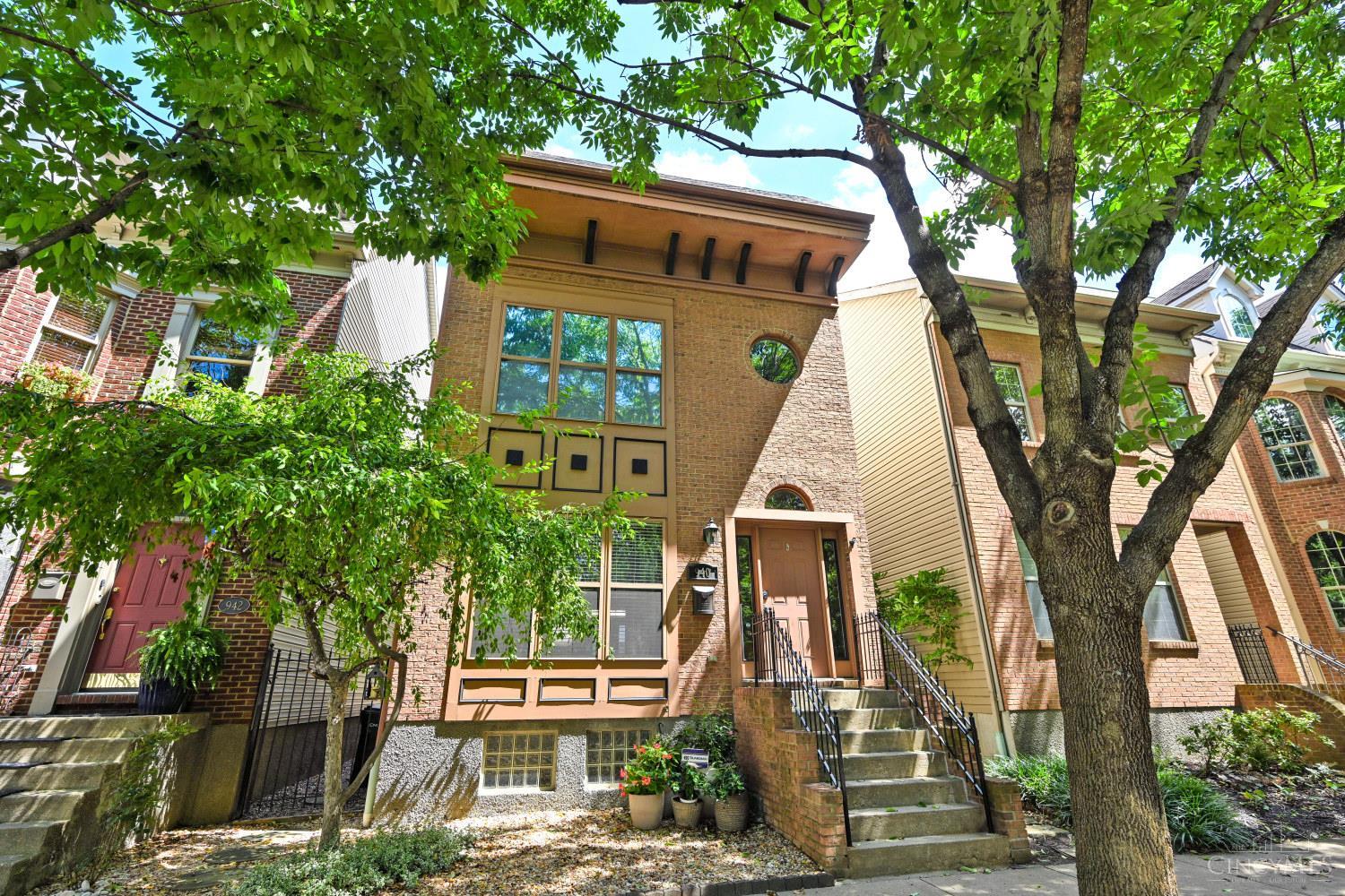 A rare single-family home offering downtown convenience with a true neighborhood feel. Located on a charming, tree-lined, permit-parking street, this Italianate-inspired home is just moments from TQL Stadium, OTR and Downtown. A two-car garage makes this an especially rare city find. Inside, enjoy refinished hardwood floors (2026), a refreshed kitchen (2025), custom California Closets and dedicated mini-split A/C in the upstairs bedrooms. The finished basement adds a third bedroom plus flexible office, gym or guest space. Major updates include furnace (2024), water heater (2025), home and garage roofs (2022) and central A/C (2018). 940 Weninger Circle offers privacy, character, modern comfort and an unbeatable location.