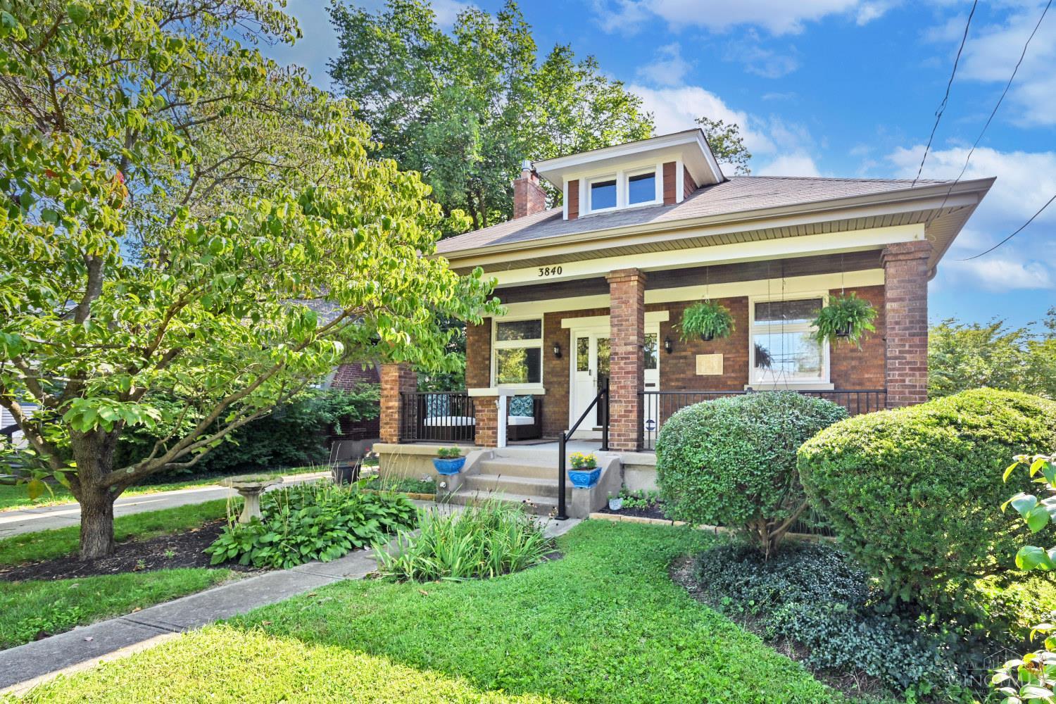 Classic American Craftsman Bungalow with early 20th century charm and appointments, plus 21st century updates.  Easy first floor living with large open living/dining room.  3 generous sized bedrooms and 2 full baths on main level.  Beautifully updated kitchen and hall bath.  Large primary bedroom with en suite bath.  Large finished lower level provides flexible space for media room, exercise, hobbies, as well as a workshop.  Over 2000 SF of finished space.  Oversized 1 car heated garage with lots of space for yard tools and potting needs.  The private deep yard backs  into HP Country Club.  Great location, close to HP Plaza, East HP restaurants and shops, Wasson Way, and all Oakley has to offer.