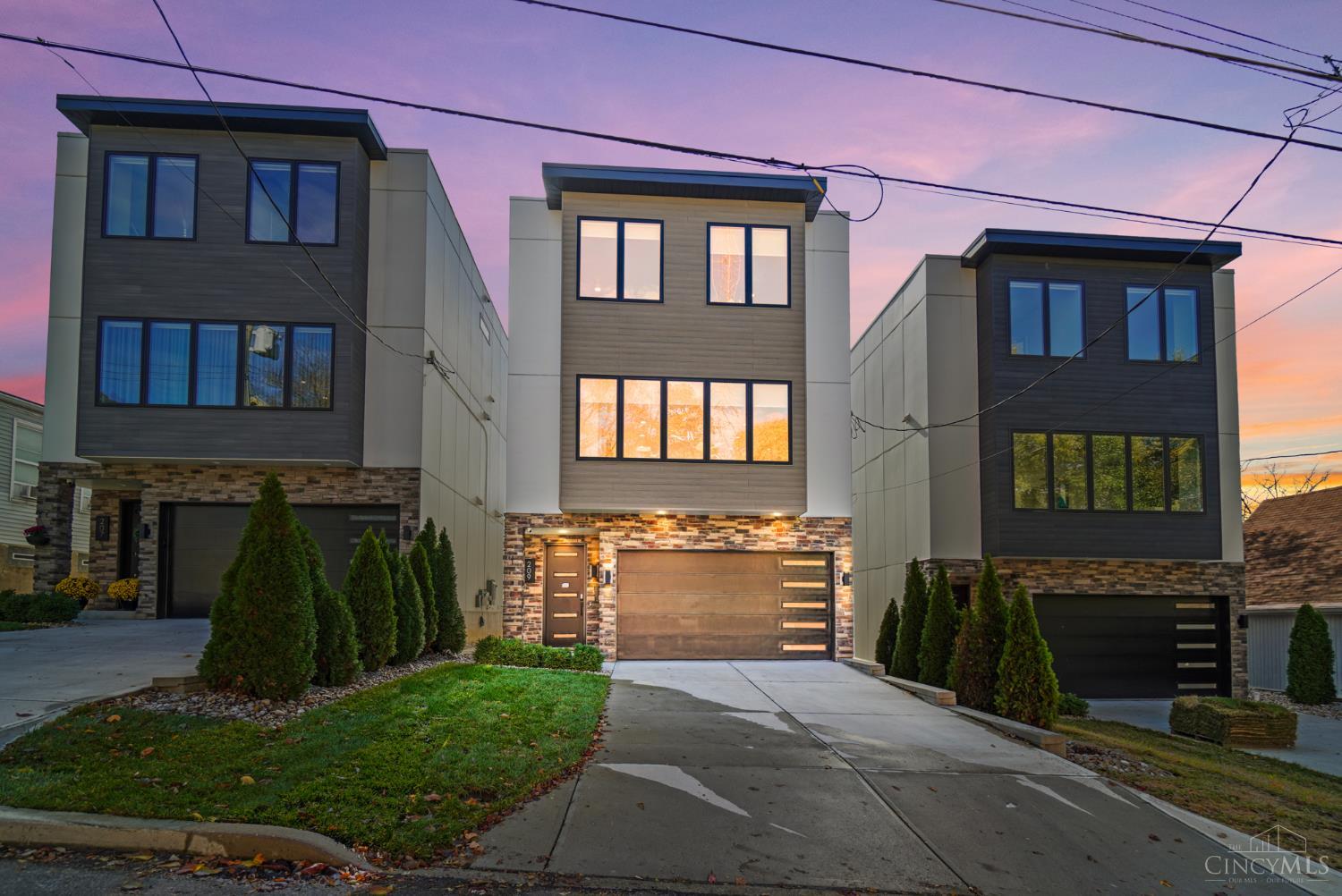 Brand new 4 bed, 3.5 bath luxury home with amazing views of downtown located mins. from UC, Good Sam, Findlay Market, OTR, & TQL stadium, LEED Platinum UNLIMITED property tax abated through 2036 literally means you pay no property taxes on house through 2036 saving you ~$23k/year in property taxes, no HOA fees, paid off rooftop solar with battery backup means you'll never lose power & ultra-low electric bills, 2 electric car chargers, 3-zone gas HVAC system, linear gas fireplace, Lutron motorized shades, security cameras, 10 ft. ceilings, 1st floor bedroom with full bath & walkout perfect for home office, huge kitchen island w/ quartz waterfall countertop, custom floating stairs, Sonos speakers, 3rd floor laundry, hot water recirculation system for instant hot water in bathrooms, Closets By Design organizers in all bedrm closets, natural gas hookups on deck for grill & fire pit, water softener, lawn irrigation system