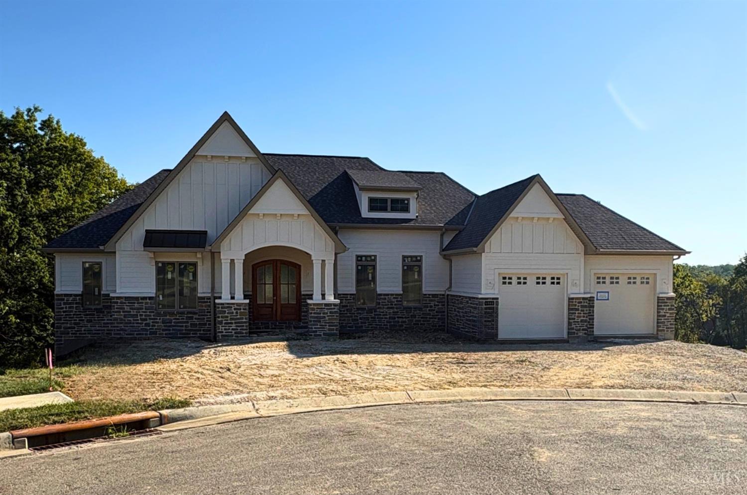 Custom Ranch style home by Dennis Ott Builders in Old Stone Ridge. Designed for both everyday living and entertaining, this open floorplan features 9+ ft ceilings, spacious great room with fireplace flows to gourmet eat-in kitchen with island bar & dining space with walkout to covered deck. First floor primary suite includes adjoining full bath with double vanities & walk-in closet; private 1st floor study. Finished walk-out lower level features expansive family room, 2 additional bedrooms & full bathroom. Other lots available to build your dream home!
