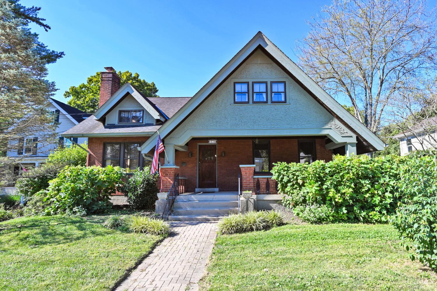 Charming home in a desirable neighborhood offering spacious living and plenty of room to grow! Beautiful hardwood floors and an open layout create a warm, inviting feel throughout. With five bedrooms and two full baths, there's room for everyone, plus flexibility for a home office or guest space. Enjoy relaxing or entertaining on the huge front porch, a wonderful spot for morning coffee or gathering with friends. The expansive yard offers endless possibilities for outdoor entertaining, gardening, play, or simply enjoying the space. The large garage is a rare find in this area.  A great opportunity to own a spacious home in a sought-after neighborhood with timeless charm and plenty of potential!