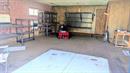 Inside the heated garage. This space was used at a family room. 20262952
