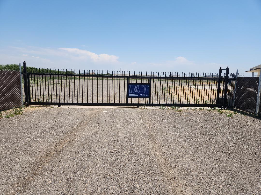 Great location just less than a mile from highway 99. All around commercial, industrial, all fenced and levelled. Buyer to verify zoning & other info with the County of Fresno.