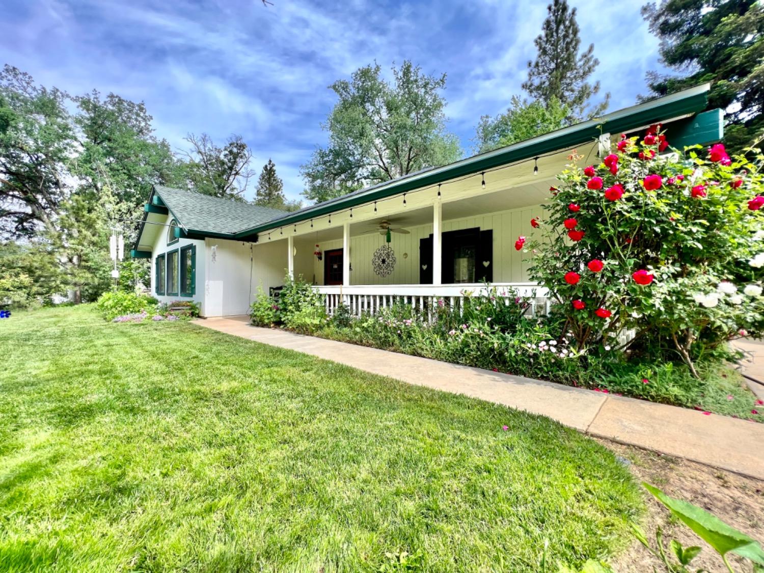 This beautiful property in Coarsegold, California is situated on just over 2 acres of land. The three-bedroom, two-bathroom house features a woodburning fire stove, making it cozy and perfect for a family or as an Airbnb rental. One of the standout features of this property is that there are no HOA fees to worry about.The property also boasts solar panels that are owned, providing energy efficiency and cost savings. Additionally, there are two backup batteries, ensuring that the home remains fully operational even during power outages. For horse enthusiasts, this property offers five covered horse stalls, three paddocks, and a 60-foot round pen. These amenities make it an ideal location for horse owners or those interested in equestrian activities. There is also an existing outbuilding on the property that has electrical connections and water supply nearby. With some plumbing work, this outbuilding can be transformed into a separate Accessory Dwelling Unit (ADU), providing additional living space or rental income potential.The property features a circle driveway, making it easy to access and providing ample parking space. Its location is also advantageous, as it is only 26 miles away from the gate of Yosemite National Park. This proximity makes it perfect for families who enjoy horseback riding or hiking on the park's trails. If you enjoy the lake life, Bass Lake is only 13 miles away, so don't forget your boat!