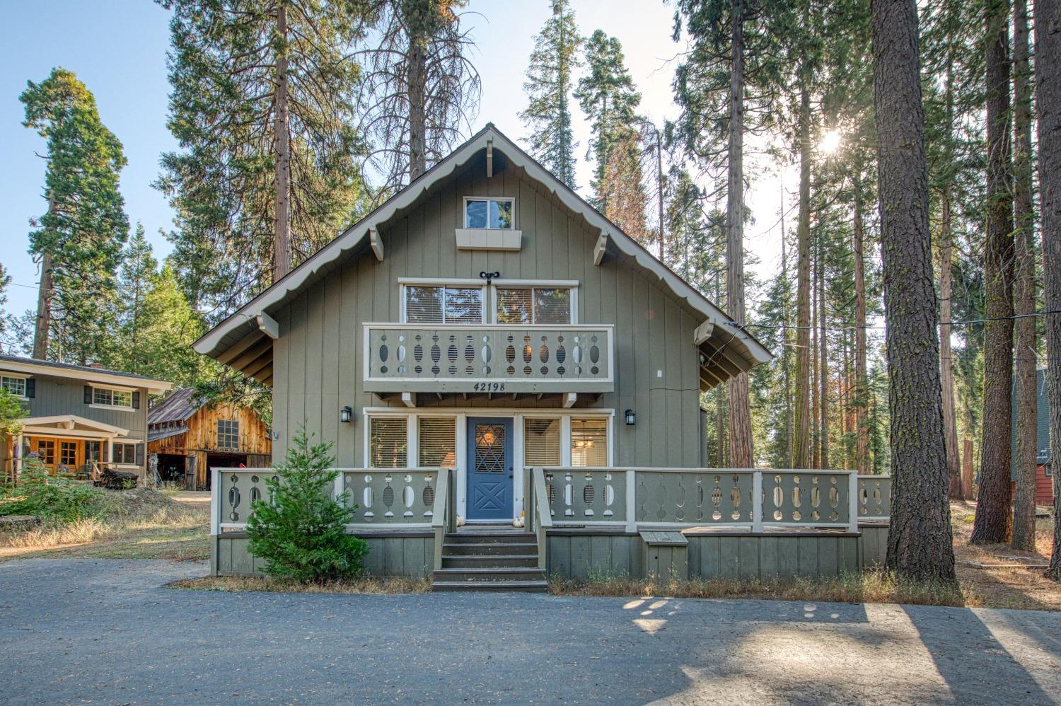 42198 Smoke Tree Lane Shaver Lake, California Darling cabin full of charm, this recently remodeled 4bed/1.75bath gem is a rarity for the spectacular condition that it is in. Natural lighting all throughout, clean as a whistle, and a layout that is sure to check everyone's boxes on their list. A sweeping deck grants the space to have large outdoor gatherings in the serenity of the mountains. This cabin is also featuring an option to have your primary bedroom upstairs OR on the main level for easy accessibility, along with a bathroom connected to each. This cabin has everything you need for a comfortable stay, including an indoor laundry area. The spacious upstairs primary bedroom has two sliding doors to provide a view ofthe scintillating sunlight coming through the evergreen trees and for the choir of the birds to lift your spirits. Also on the second story, two other bedrooms allow for ample space to sleep extra friends,family, or guests on a getaway to the beautiful Shaver Lake forest. This cabin's current set up sleeps 8, and is located in Sierra Cedars which allows short term rentals. Call today, and make this your future backdrop for memories to be made!