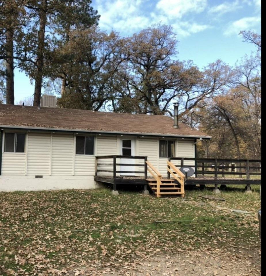 Are you looking for a 3 BD home w/a shop on acreage for under $300k? Well you've found it! This 3 BD, 1 BA stick built home on 2.82+/- flat & usable acres is in the very desirable Lush Meadows neighborhood. There is a fenced backyard for household pets & some fencing in place for horses & other livestock. There is a lg. pump house w/laundry hookups & room for storage, as well as a 12x20 shop for all your tools & toys. Included in the purchase of this home is a key to access 2 privately shared lakes stocked w/fish, one of which provides a clubhouse available. This home has vaulted ceilings & an open floor plan, w/a good sized kitchen/living/dining area. Curl up next to the lg. wood stove on those winter nights, or enjoy the convenience of a 