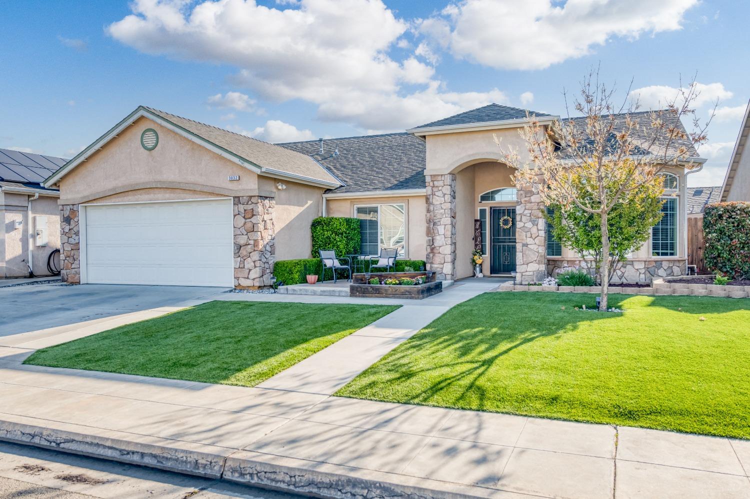 This is the one you've been looking for! For starters it's located in a great neighborhood in the award winning Clovis Unified school district. There is also a Neighborhood park right around the corner that includes a playground and a large grass area. When you walk in the front door of this home you will immediately notice the upgraded flooring throughout that leads you into a spacious open concept living room with a fireplace and vaulted ceilings, which is also open to the kitchen that features granite counter tops, eating bar, pantry, and a dining area that leads out to the backyard covered patio. The home features 4 large bedrooms including a 5th room that can be used as a second living space, formal dining room, playroom, or whatever you heart desires. The large master bedroom has backyard access, a walk in closet, master bath with dual sinks, a soaking tub, and a separate shower. The front and backyard are well maintained with Synthetic lawn and raised flower beds, perfect for those looking for low maintenance landscaping. There was Govee outside LED holiday lighting installed in Nov of 2023. Did I mention the home also has owned solar! The 26 panels where just installed in Dec. of 2023. This home truly represents tasteful design and pride in ownership, don't miss your chance to make this home yours!