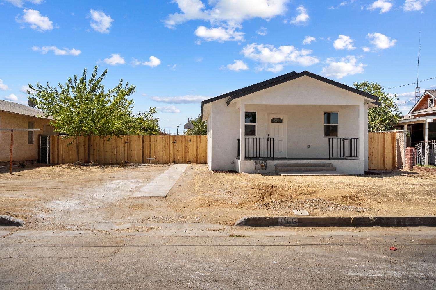 This 3-bedroom, 2.5-bath home is a fantastic opportunity for families or investors seeking passive income. Recently refreshed, this property features stylish laminate floors throughout, with brand new carpet in the bedrooms. The new windows and fresh paint brighten the space, while the newly installed fence offers potential RV access, adding to its versatility. Though cozy, the living room provides a welcoming space for relaxation while seamlessly flowing right into the kitchen. The kitchen is a highlight, boasting quartz countertops, new cabinets, a convenient pantry, and a charming breakfast nook. A powder room for guests enhances the home's practicality. The master suite is complete with a walk-in closet, beautifully tiled shower walls, and a new vanity and fixtures in the full bath. Bedrooms 2 and 3 are connected by a Jack and Jill bathroom featuring dual sinks, a new vanity, and fixtures, making it perfect for kids. The large backyard offers potential RV access and features a delightful fruit tree, providing ample space for outdoor activities and gardening. Located within just 500 feet walking distance to Roosevelt Park. Whether you're looking for a family home or a smart investment, this property is sure to meet your needs.