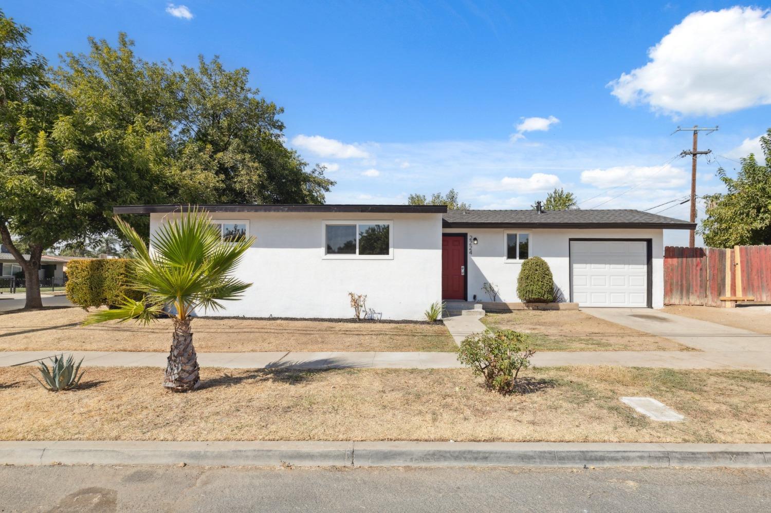 2224 W Shields Avenue Fresno, California Remodeled move in ready home situated on a corner lot with RV PARKING! This home has undergone a transformation and is ready for its new owner. Upon entry you have the great room showcasing LVP flooring and plenty of natural light. The well appointed kitchen offers new shaker style cabinetry, quartz counters and subway tile backsplash. There's 3 bedrooms, 1 bathroom and indoor laundry. New dual pane windows and all new fixtures make this home truly turn key! There's indoor laundry and an attached 1 car garage. Out back you have a great size yard, perfect for friends and family to gather. Conveniently located close to schools, shopping and so much more, make your appointment today.