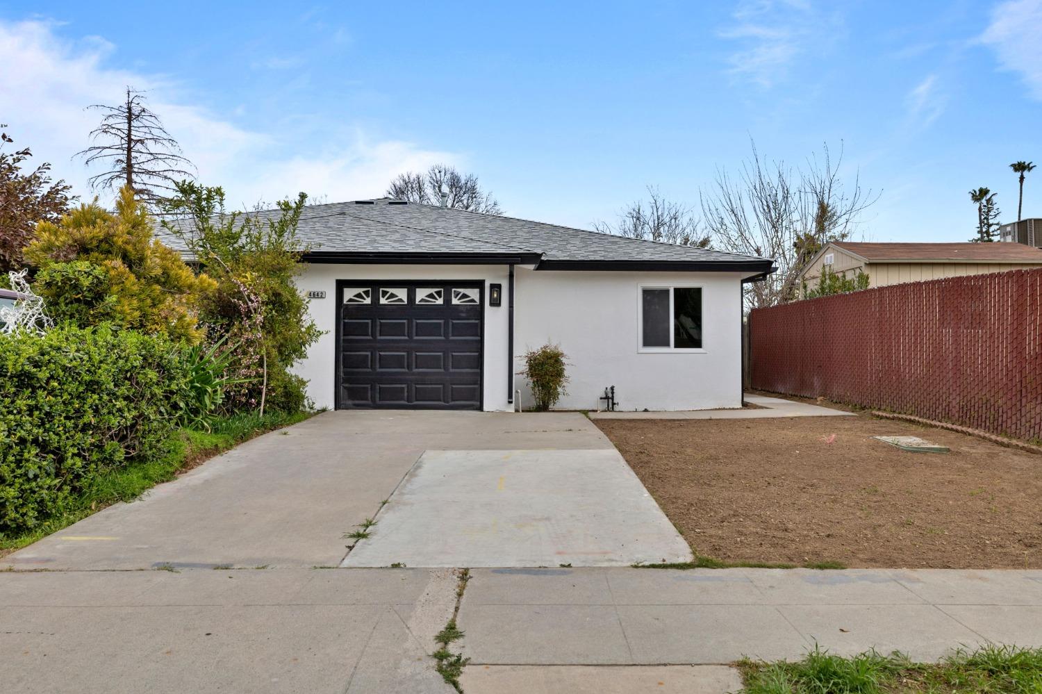 4642 W Ashlan Avenue Fresno, California Priced just reduced!!! Welcome to this beautifully updated 2-bedroom, 2-bathroom home, completely transformed with high-quality upgrades throughout! Every detail has been thoughtfully designed to make this home move-in ready and ideal for modern living.As you step inside, you're greeted by an open, inviting floor plan featuring brand-new flooring, fresh interior and exterior paint, new windows, and stylish lighting fixtures including a brand new ceiling fan. The fully remodeled kitchen boasts new quartz countertops, updated cabinetry, and stainless steel appliances and modern finishes.Both bathrooms have been elegantly remodeled, with new vanities, custom tile work, upgraded fixtures, and quartz countertops. The spacious bedrooms are enhanced by new flooring, new light fixtures, and an abundance of natural light pouring in through the new dual-pane windows, improving both comfort and energy efficiency.Step outside to an ample backyard featuring a lemon tree, and enjoy the covered patio an ideal space for relaxing or entertaining.Situated close to schools, shopping, dining, and major highways, this home is a must-see. Schedule your private showing today!The seller is willing to consider offering concessions with a full-price offer
