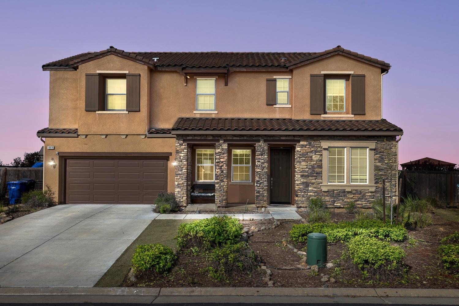 Luxurious gated Mira Bella Estates Community home on nice large half an acre. Enjoy the peaceful foothill living, with fantastic views of the valley off your balcony or patio. Located just 10 minutes from Fresno/Clovis near Millerton Lake. Enjoy all Mira Bella has to offer including a community pool, tennis and basketball courts, green common areas. Close access to hiking and open nature. This home has a Gourmet Kitchen with large center island an abundance of cabinets. Extra-large Butler Pantry for all your storage needs. Inviting Formal Living Room dining room. One bedroom and bathroom downstairs. Upstairs the Main Suite is large with a spa like bathroom. There is a large balcony to enjoy those gorgeous foothill views. Bonus Room upstairs, along with 4 other bedrooms and the Laundry Room.Nice large yard, with potential RV. Breathtaking views from your back patio. Home has turf grass for low maintenance.  Come view and enjoy the serene and beauty this home has for your family to create wonderful memories.