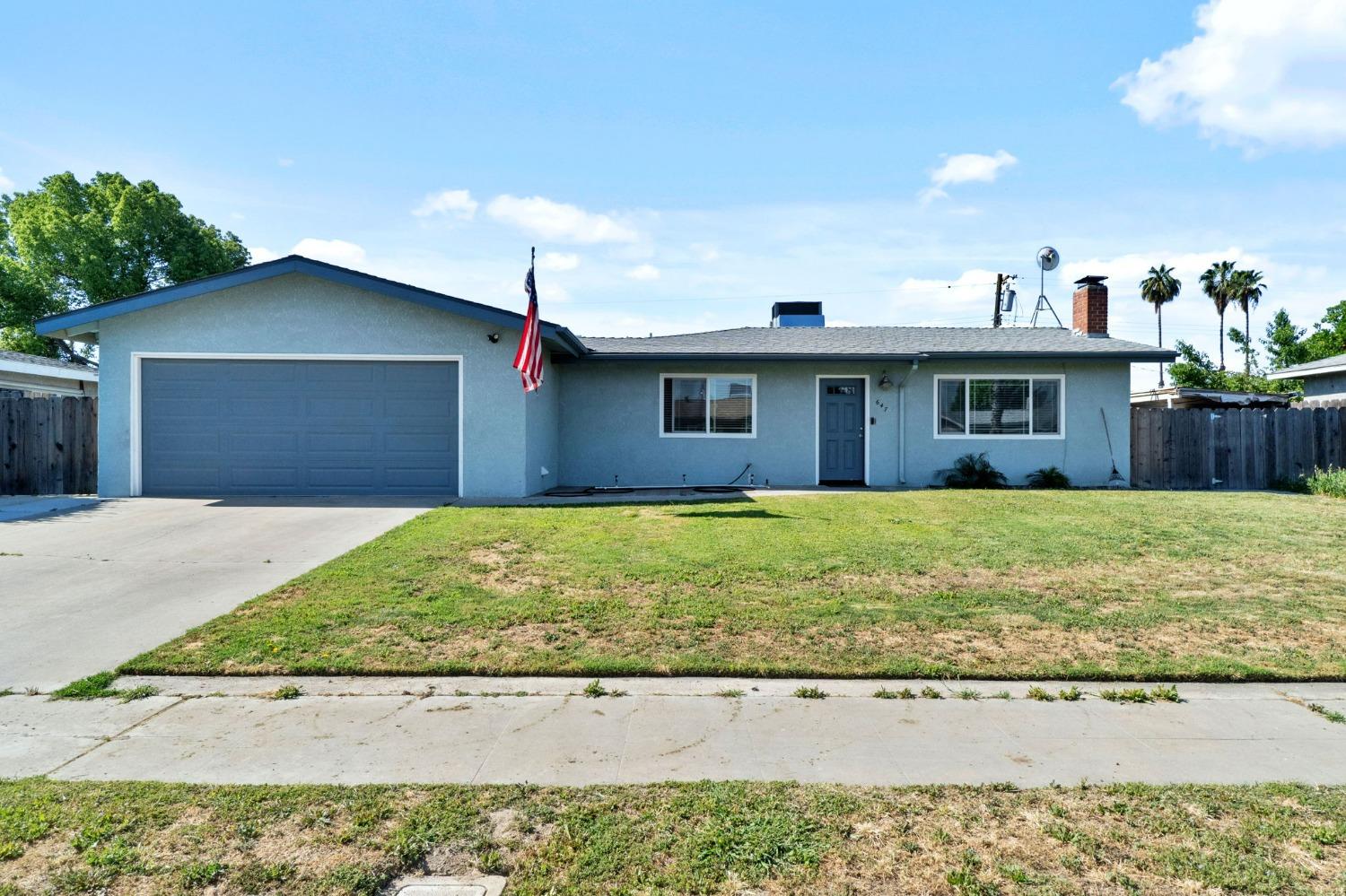 647 E Hopkins Avenue Fresno, California This 972 sq ft remodeled home is a haven of comfort, style, and functionality. With 2 spacious bedrooms and 1 well-appointed bathroom, it offers a lifestyle that balances charming character with modern conveniences.The adorable kitchen is a true heart of the home, featuring a cozy eating area where you can enjoy meals with family and friends. The spacious living room is perfect for relaxation and entertainment, filled with natural light thanks to the new dual pane windows. Its open layout makes it ideal for social gatherings or simply unwinding after a long day.Generously sized bedrooms provide a tranquil retreat, offering ample space for rest and relaxation. The expansive lot is perfect for outdoor activities, entertaining, or simply enjoying the fresh air. In 2021 the home received updates that enhanced the home's appeal, including a new roof, new AC, fresh exterior and interior paint, modern flooring, and stylish fixtures throughout.This home seamlessly combines practicality with charm, making it an ideal match for those seeking a move-in ready property. With a solar lease, it's a smart and sustainable choice, designed to reduce your carbon footprint and save on energy costs. Make this home your own and start creating cherished memories with your loved ones. Its perfect blend of charm, modernity, and functionality makes it a truly special place to call home.