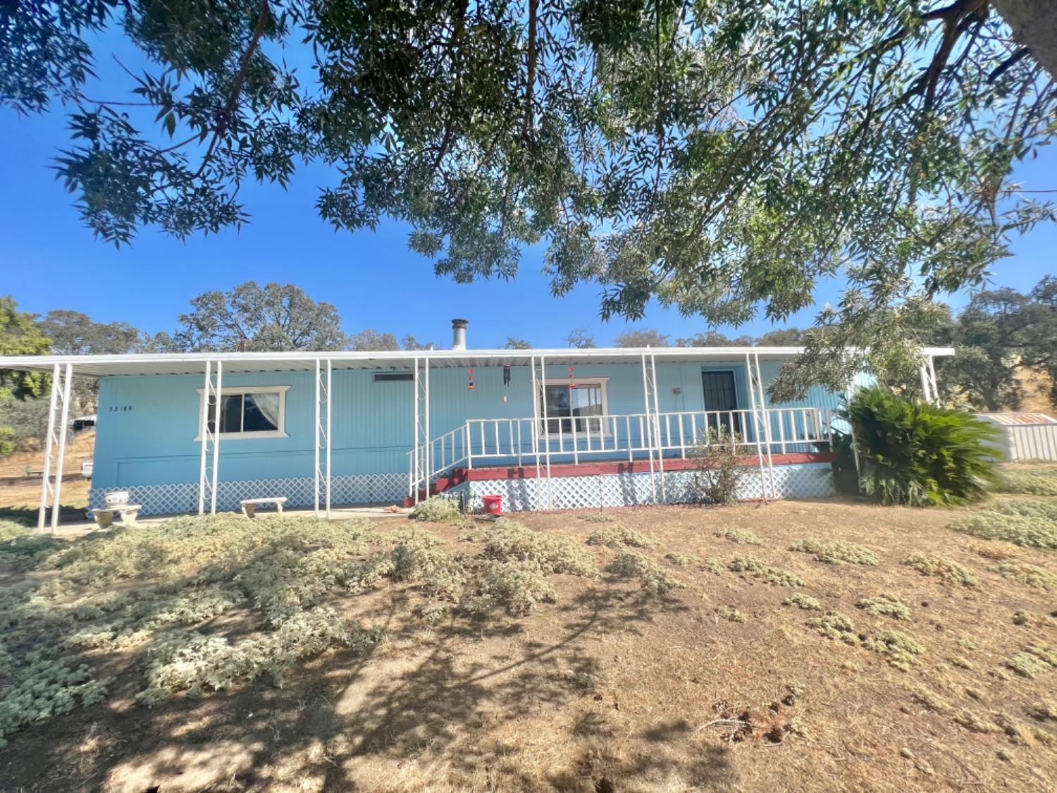 33188 George Smith Road Yokuts Valley, California Welcome to this exceptional real estate opportunity in a prime location on George Smith near Hwy 180, making a short commute. Prepare to be amazed by the immaculate condition of both the property and the home. Every detail has been carefully attended to, ensuring a truly pristine living experience. Enter inside the upgraded home and begreeted by the warmth and comfort that dual pane windows provide, along with the added benefits of an updated roof coating and cozy pellet stove. The thoughtful upgrades create an inviting atmosphere that you'll love coming home to. Enjoy the best of outdoor living with a great covered front deck and a covered rear concrete patio, perfect for relaxing or entertaining guests. Bath count may differ from tax records, buyer to verify.