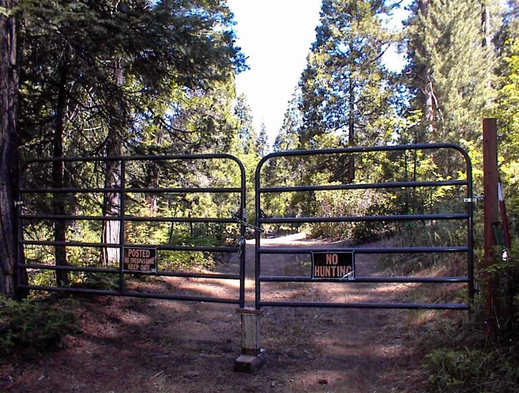 Sequoia Lake Trio - This property is one of three unique 40 acre parcels located at the 5,000 foot elevation just west of Sequoia Lake in the Sequoia National Forest. Each of these parcels offer a rare private generational foothold in one the world's most scenic spots within touch of the majestic Kings River Canyon (deepest in the United States) and the Giant Redwoods (largest trees in the world) of Sequoia National Park.  Formerly owned by the YMCA (caretaker and owner of Sequoia Lake), each of these forested 40 acre lots have individually unique features in a truly rustic and native environment offering the future owner a rare opportunity to create a private, generationally significant large landhold in the center of one of the world's most scenic resources. Each of these parcels have paved road access from Millwood Road (an 1800's road created to provide access to log the Giant Redwoods).This property is called the Sequoia Ridgetop 40. As the name implies, it runs along a scenic ridge with the national forest as its boundary on the west. Most of the property has gentle, ridgetop terrain with multiple potential building sites including the site of the original cabin built in the early 1900's. It was destroyed in an accidental fire about 30 years ago, but the water tower still stands today. This forested parcel has a great mix of conifers, black oaks, and dogwoods with some truly unique rock formations and breathtaking natural scenery in a very secluded and private setting.