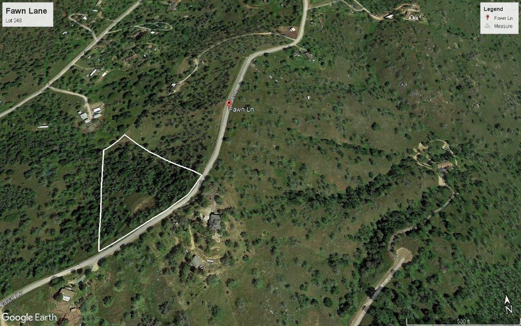 It was a cloudy day for pictures, but have no doubts this 5.31 acre parcel has massive views of the entire Squaw Valley area and the San Joaquin Valley to the west. Perched on a distinct ridgeline overlooking Squaw Valley to the North,this hillside parcel has steep terrain but is buildable. That is evidenced by the large pad and drive that have been constructed to take advantage of that magnificent view. The location and the surrounding terrain ensure that you will have complete privacy from the neighbors. Power is aavailagble at the property line. Plus you have the added benefit of being closse to Hwy 180 for an ewasy commute to town. The seller will consider carrying paper with an accewptable down payment and terms. But don't take my word for it. Take a drive and experiennce that breathtaking view for yourself.