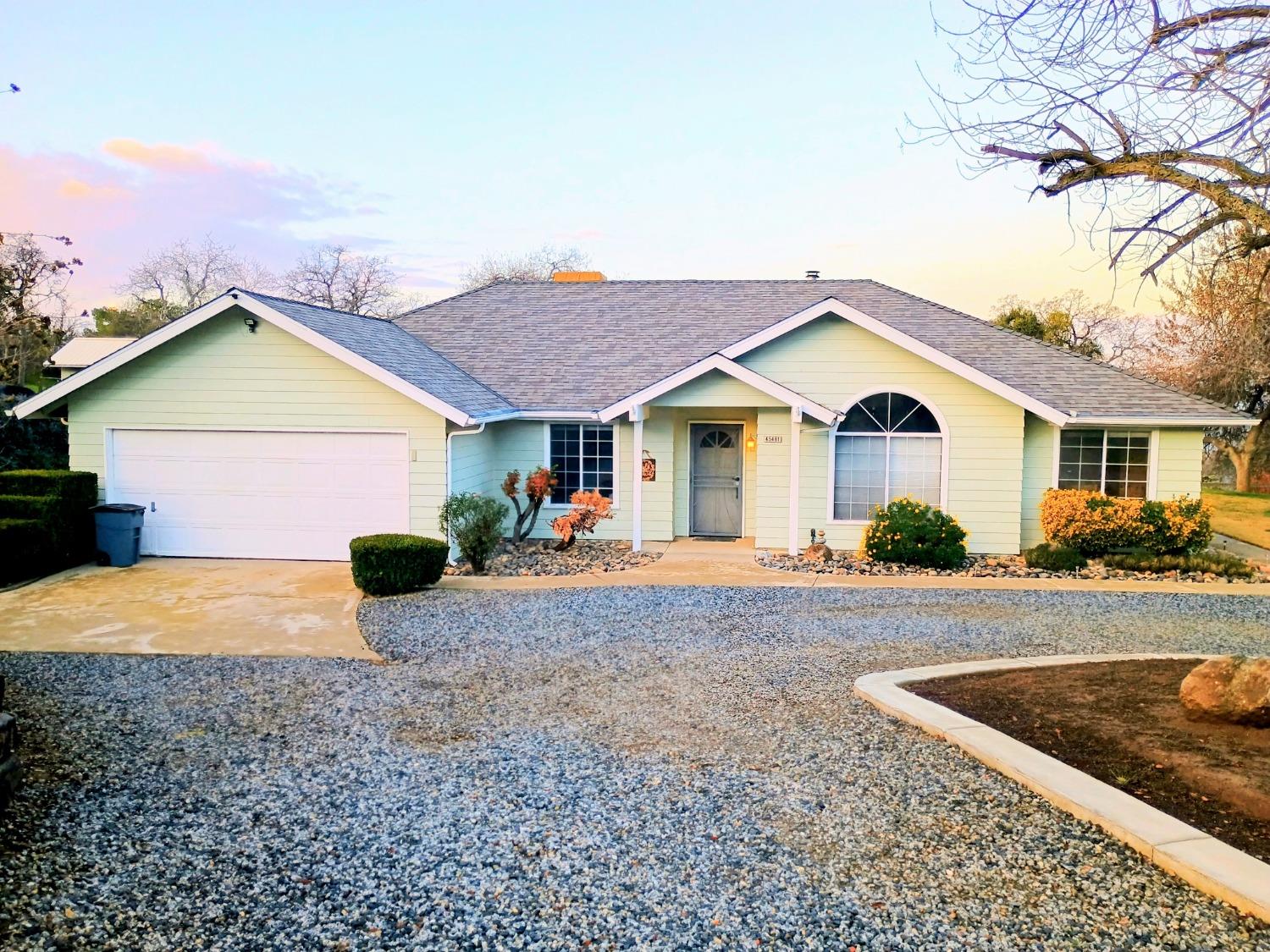 45481 Longview Road Yokuts Valley, California Charming custom foothill home. Hands down, this is the nicest property on the market in Squaw Valley, and the most complete. Space limits our remarks but here's an overview. The site is a 4.93 ac parcel with a San Joaquin Valley view. The home is a 4br2ba custom Bricker built w/2418sf and 2x6 construction. Floorplan is a classic design with formal living, dining, and large open kitchen/family room with brick fireplace and woodstove insert. Huge master suite w/spa tub and direct access to heated freeform pool. There's a 1200sf shop, a 400sf shop and an RV hookup. There is a whole house owned solar system w/partial battery backup. Pool has separate solar water heater. There are dual HVAC systems plus separate evaporative cooler and a 1,000 gallon propane tank. Well is 12gpm w/a 5000 gal storage tank. 3 year old roofs on house and large shop. Property is fenced and cross fenced for animals, and a custom catio. Entire property is in excellent condition. This property also has terriffic pprivacy, awesome views and great function.