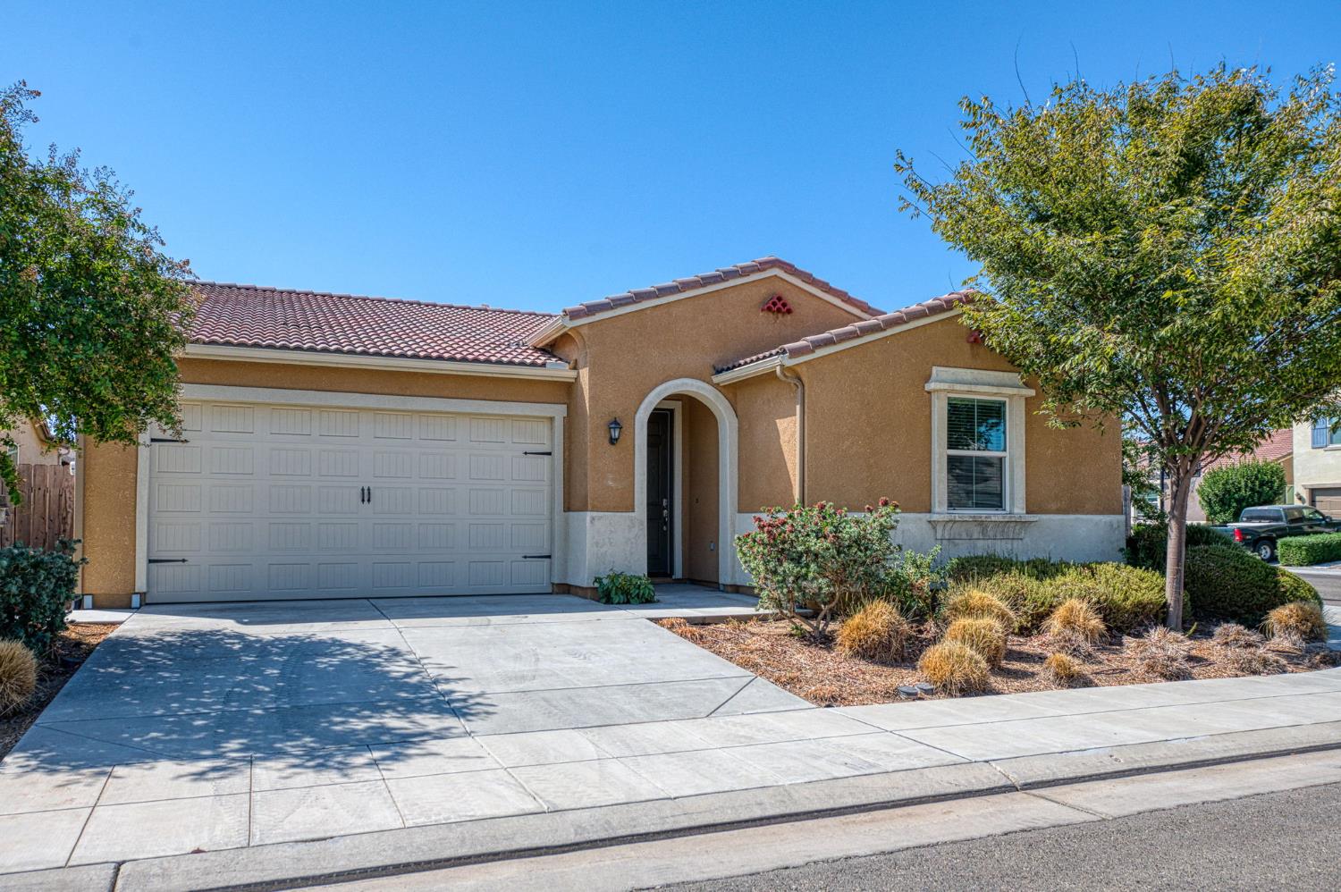 OPEN HOUSE: Saturday 9/5 & Sunday 9/6 - 12:00 to 4:00PMWelcome to 3830 Saginaw Ave, a beautifully maintained 4-bedroom, 2-bathroom Wilson home offering the perfect combination of location, comfort, style, and low-maintenance living!Located in the highly sought-after Clovis Unified School District, this home is conveniently situated just 1/2 mile from Reagan Elementary School and 3/4 mile from Clovis East High School. A neighborhood park is also within walking distance.Set on a spacious corner lot, the home offers an expansive covered patio and custom concrete walkways, providing a wonderful outdoor space for relaxing, entertaining, and enjoying the outdoors year-round.Inside, the inviting open-concept floor plan seamlessly connects the living room and kitchen. Beautiful wood-look tile plank flooring flows throughout the main living areas, while large windows fill the home with natural light.The spacious kitchen is a standout feature, offering an over-sized island with granite countertops, gorgeous wood cabinetry, subway tile back splash, and GE stainless steel appliances. The open layout makes it easy to stay connected with family and guests while cooking and entertaining.The private primary suite is thoughtfully positioned on the east side of the home and features a generous bedroom, walk-in closet, ensuite bathroom, with shower, built-in soaking tub, and dual-sink vanity.Three additional bedrooms are located on the west side of the home, along with a guest bathroom that includes a double-sink vanity. The bedrooms are comfortably carpeted, and an indoor laundry room adds everyday convenience.Additional features include a washer, dryer, and refrigerator - all included with the sale.Located in a well-maintained neighborhood near Ashlan and Leonard, this home offers convenient access to schools, parks, shopping, dining and everyday amenities.Offering the space, location, and thoughtful features you've been looking for, come and see why this could be the perfect place to call home or investment opportunity!
