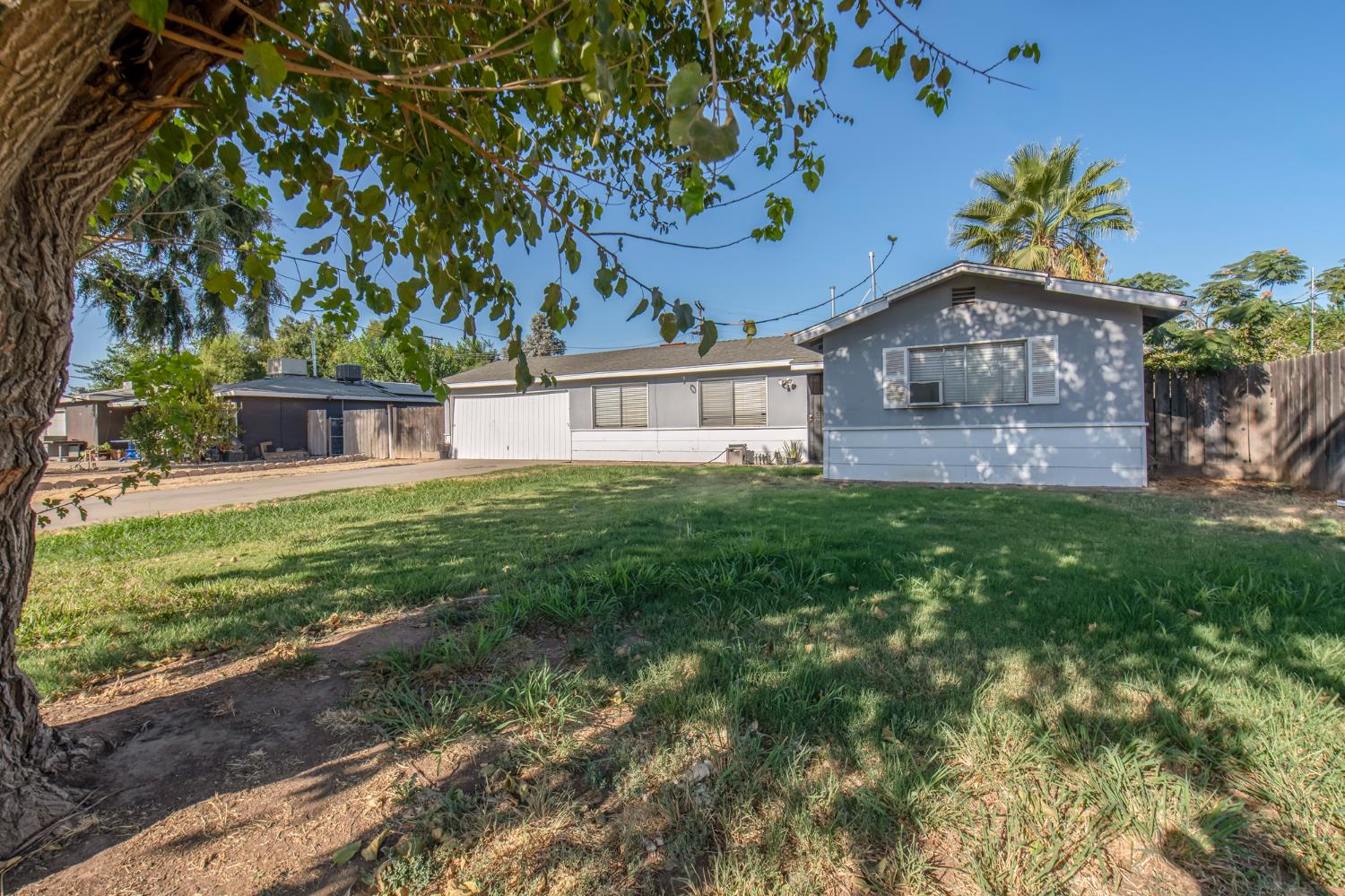 An excellent opportunity for a first-time homebuyer looking to put down roots and make a home their own! This well-cared-for 3-bedroom, 1-bath home offers approximately 1,100 sq. ft. of living space on a generous 9,400 sq. ft. lot. Built in 1958, the home has been maintained over the years and is ready for its next chapter. While it could use some TLC and updating, it offers a solid opportunity to add your own personal style over time. The backyard is currently mostly undeveloped, creating a blank canvas for future landscaping, gardening, entertaining, or simply enjoying the additional outdoor space. A great opportunity for a first-time buyer, someone looking for a project, or anyone wanting a home with a larger lot and room to add value. Very close to freeway 41 access for easy commuting and minutes from River Park and shopping.