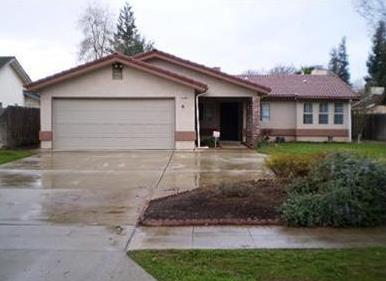 Charming Northwest home close to Fig Garden, featuring vaulted ceilings and an open-concept living room and kitchen filled with natural light. The kitchen offers new appliances, granite countertops, and a cozy eat-in area. Freshly painted with new carpet just installed, the home includes a spacious main suite with a large walk-in closet and a bathroom with dual sinks and a generous shower. Secondary bedrooms are nicely sized, with one also offering a walk-in closet. Inside laundry and a handy desk area make it perfect for a small home office or homework space. Ample linen storage and a good-sized yard with a large covered patio make it ideal for entertaining.Make your appointment to today to see this beautiful home.