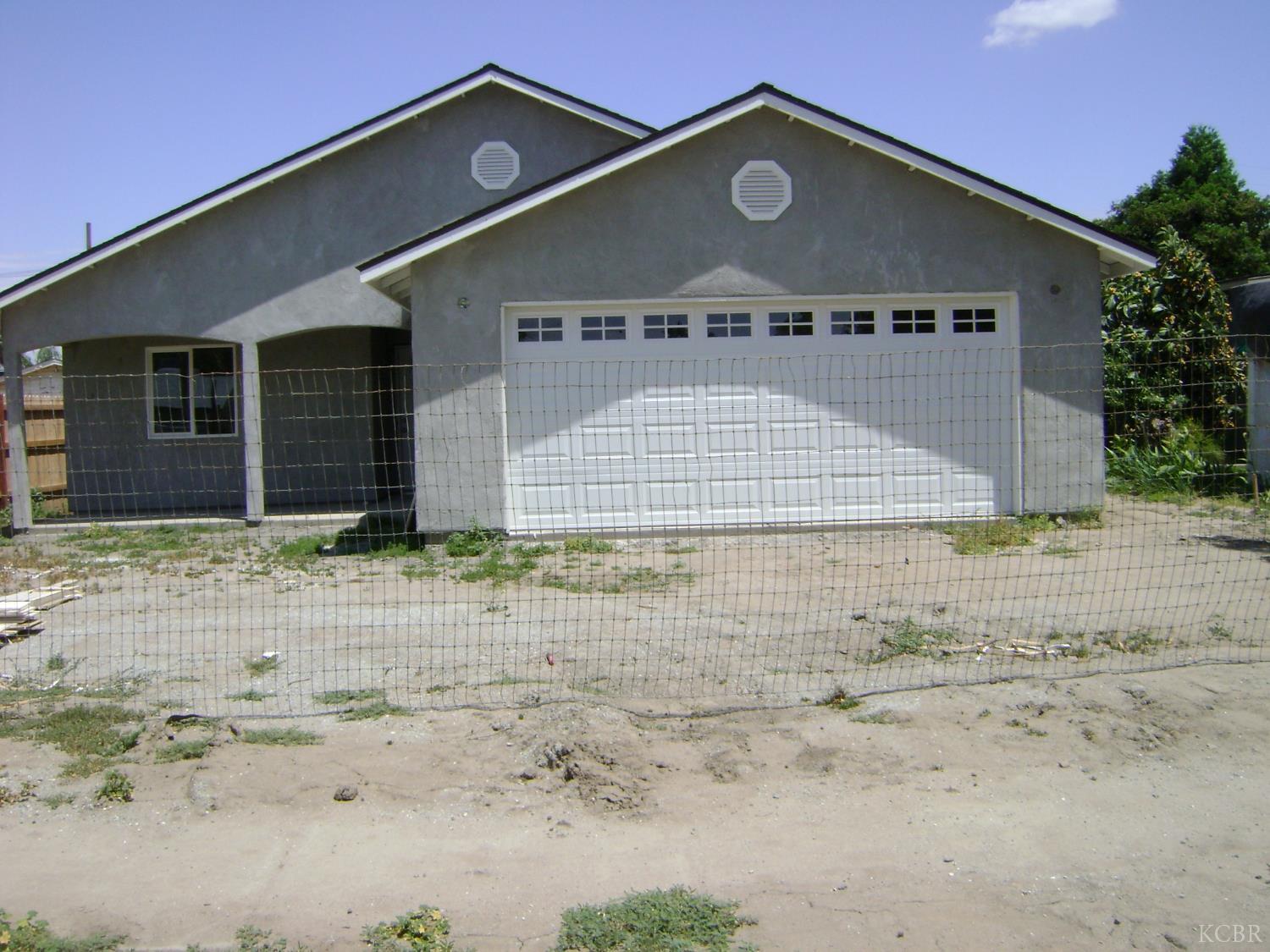 328 N D Street Tulare, California This is a New House with 4 beds 2 Bath, Price Just Right