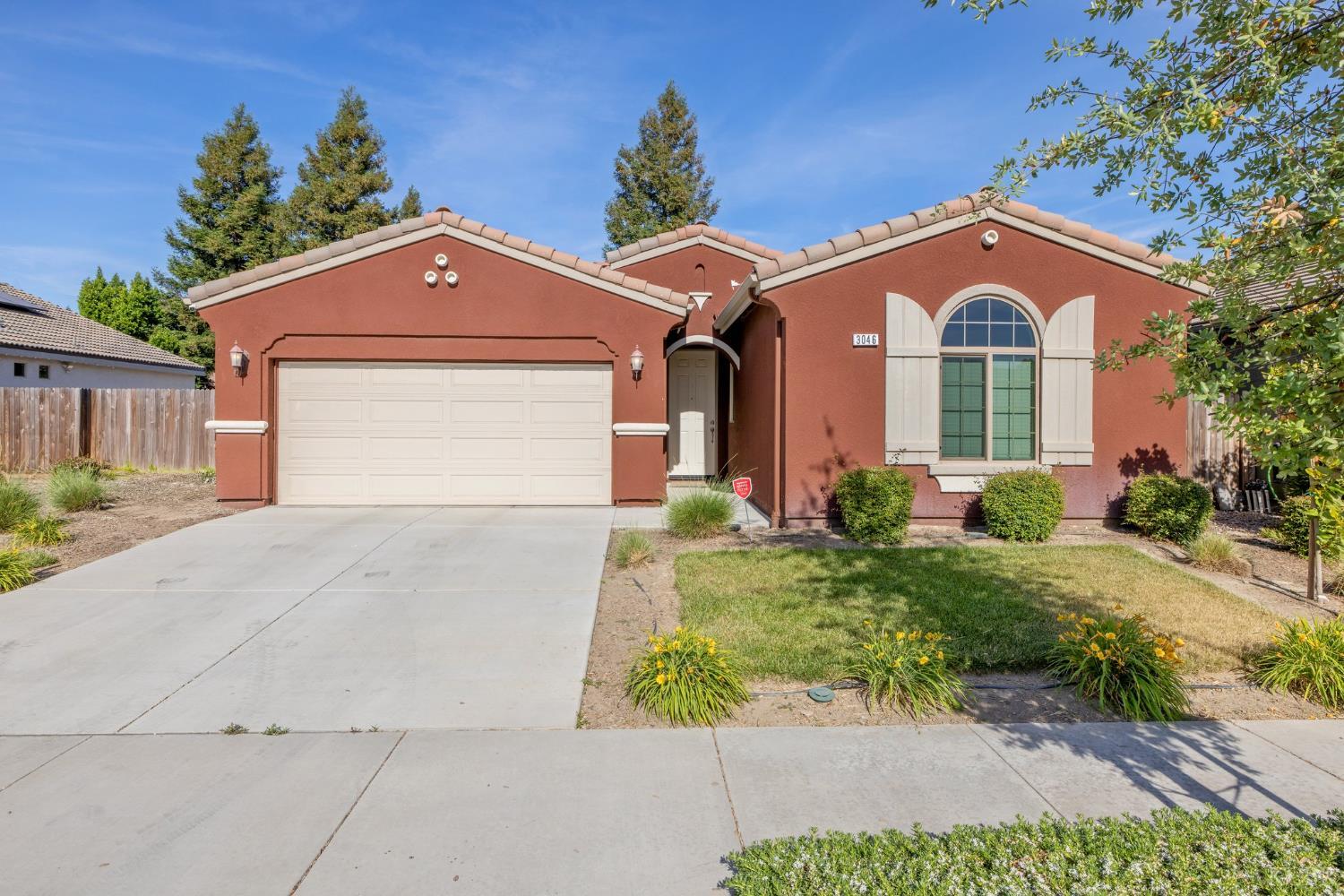 3046 S Kennedy Street Visalia, California Come see this beautiful newer home! Featuring new carpet, fresh paint, and an open floor plan perfect for cozy family gatherings. The kitchen flows seamlessly into the living area, so you can cook while still enjoying time with loved ones. Step outside to a covered patio, ideal for summer BBQs and relaxing in the shade. If you're ready to move, this home is ready for you!