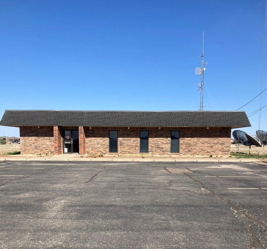 The property is the radio station building and land that has been known as KKYN Radio. Some of the large property of 6.388 acres can be developed. There are 5626 sq. ft. of pavement and lots of parking.