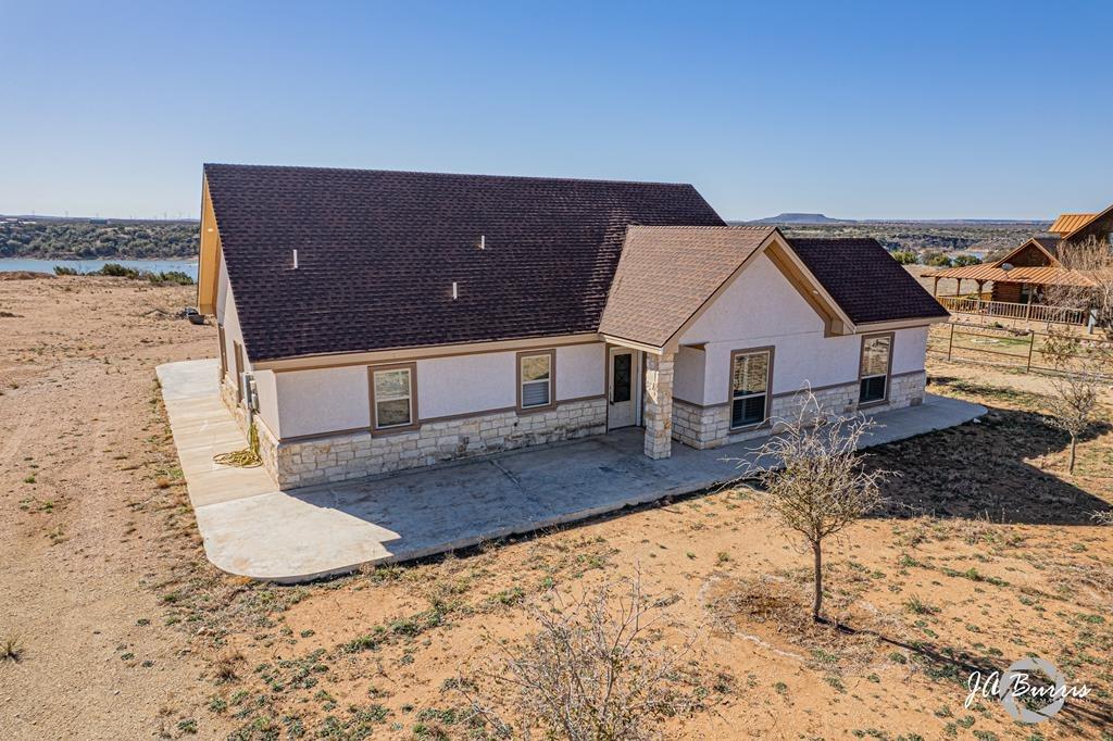 Furnished  3 x 2 with 2000 sq Ft Home off Lake Alan Henry sitting on 6.28 acres.  Newer Built Home with Custom Features including fireplace, fantastic kitchen, flooring, light fixtures, & much more.