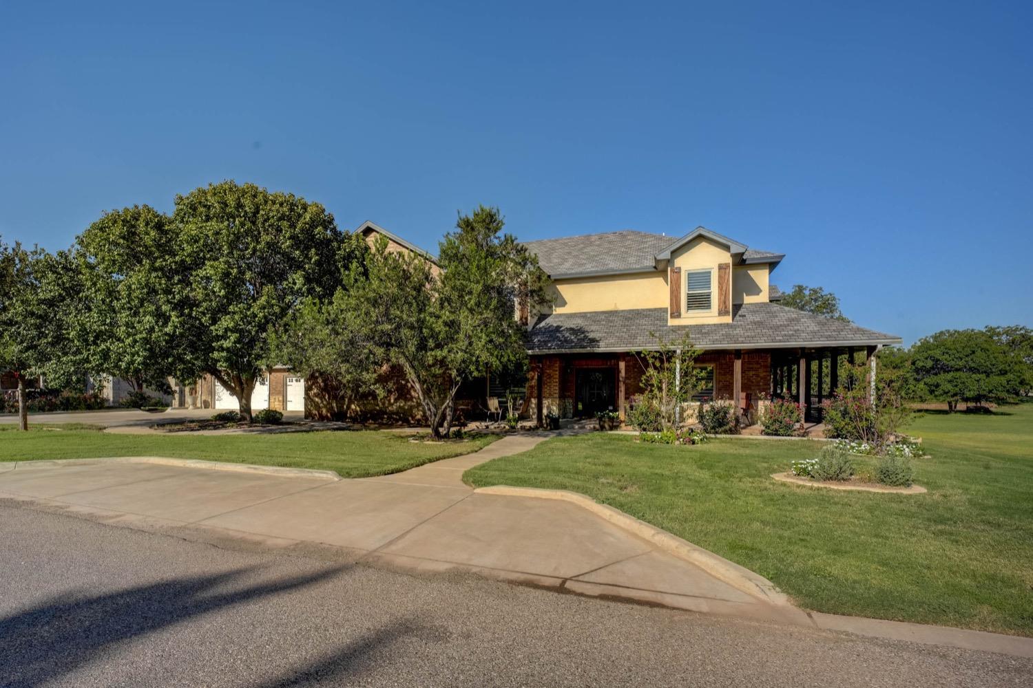 Just a walk away from Lubbock Country Club, this STUNNING home is a must-see! 6000+ sq/ft of beauty!! Walk in and fall in love. So many entertaining options! This gorgeous home has it all plus some, including 2 master suites and a third bedroom with its own ensuite bath, two kitchens, a basement, separate movie theater room, large laundry/utility room, mudroom and multiple living areas. The master boasts huge his and hers closets. The awesome wrap-around porch is the perfect place to sit and enjoy your morning coffee. And don't miss the private patio off of the downstairs master suite. You won't find anything like this in Lubbock! Beautifully finished out and completely renovated; this one-of-a-kind STUNNER could be yours!!