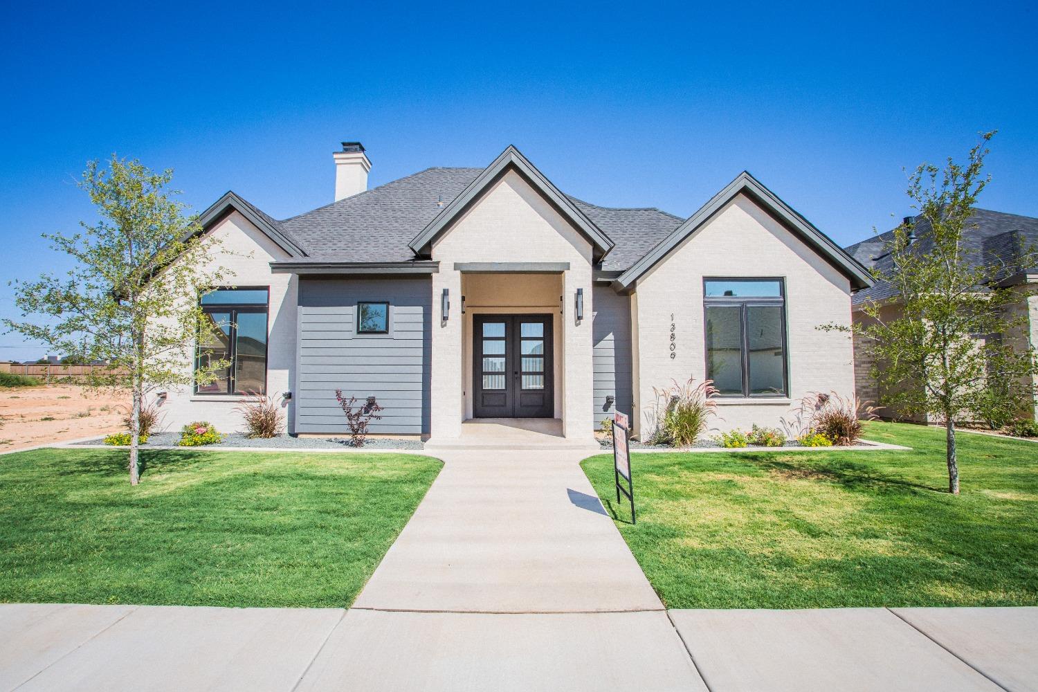 This immaculate new build in the Stratford Pointe just a short walk away from Lubbock's newest upscale Golf club Redfeather! Beautifully landscaped low maintenance backyard, enormous master walk-in closet, and an entryway that exudes opulence. This 3-bedroom,2.5-bath garden home brings the perfect living space for those who adore exquisite details. Boasting 2,554 square feet of spacious living including a gourmet kitchen for the pickiest of chefs. Entering through the charming French doors, you'll be captivated by the abundance of windows and high ceilings that flood the home with natural light throughout the open and airy layout; stunning luxury vinyl plank floors highlight stone accents and blend charmingly with the soft white and grey tones found through the home. This masterful design uniquely embodies both luxury with clean neutral colors and elegant accents while embracing highly sought-after modern features. You have found your new home in one of Lubbock's newest subdivision.