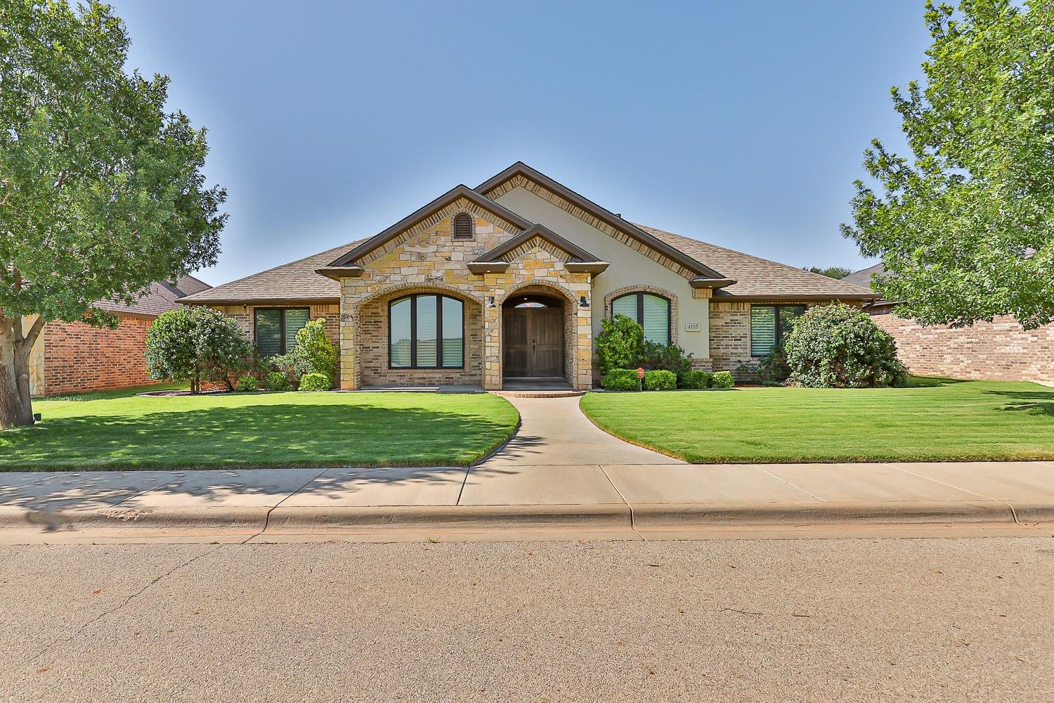 Discover the beauty of this custom-built 4-bed, 3-bath home in Brooke Heights, in highly desired Lubbock Cooper ISD. Enjoy an open living/kitchen area with a stone fireplace, granite island, custom cabinets, and stainless steel appliances. The master suite offers a spa tub, tiled shower, two large closets, and convienent back patio access.  This home offers two eating areas, one of which is the dining room featuring a stunning built-in buffet with wine rack. Spacious laundry room with extra storage. The large backyard boasts a built-in kitchen, charming pergola, and privacy fence.  The  park's serene ambiance is accentuated by its tranquil lighting system. The property comes with several notable upgrades, including a new condenser unit, a state-of-the-art Wi-Fi b-hyve smart outdoor sprinkler system, a Vivint security camera system, a new microwave and dishwasher and a reverse osmosis water system has been installed. Seller offering $2,500 paint allowance with acceptable offer.