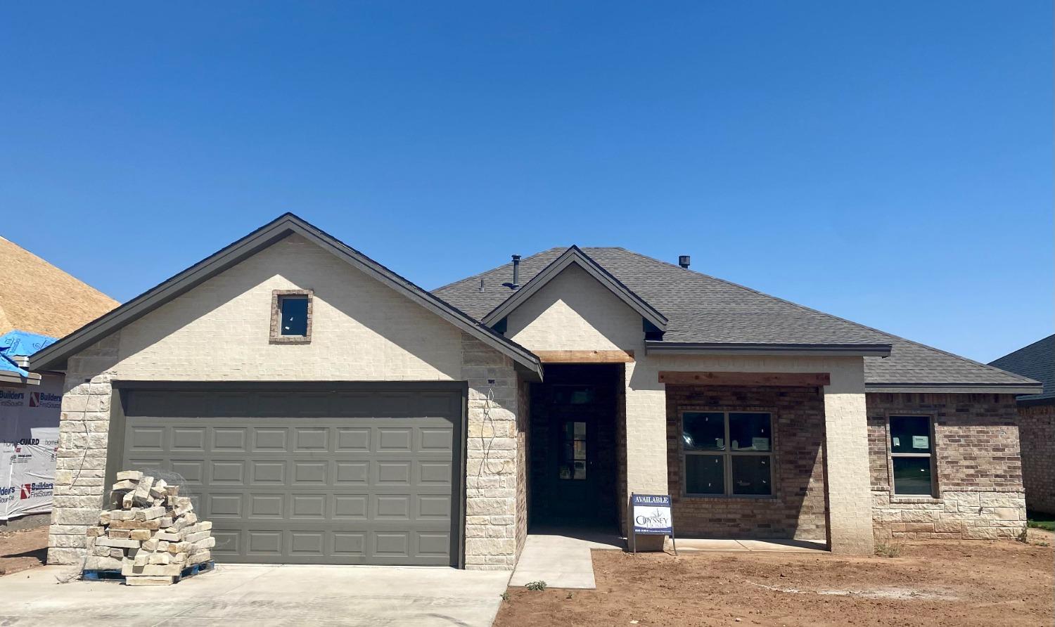 Brand new construction by Odyssey Homes in Hatton Place. The open floor plan features a large living room with a cathedral ceiling and a stone fireplace. It also features beautiful wood look tile throughout the entire main area, something you typically don't see in the price point. The master has a large walk in closet, double vanities and a special ceiling.  The home also includes a half bath off the main area for guests to use and a large covered back patio.