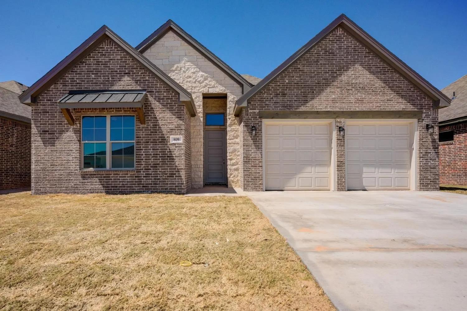 This home could qualify for a 4.5% interest rate!! Just minutes from shopping, dining, Texas Tech, the medical district, and Frenship Schools the location could not be better. From the minute you step inside this 3 bedroom, 2 bathroom home you will think spacious. The vinyl plank floors, carpeted bedrooms, custom tile fireplace, and quartz countertops throughout are just a few of the amenities this home has to offer. Right off the front of the house are two large bedrooms and a bathroom with double sinks. Then the isolated master features a separate soaking tub and shower, double sinks, and oversized his and hers closets! Book your tour soon!