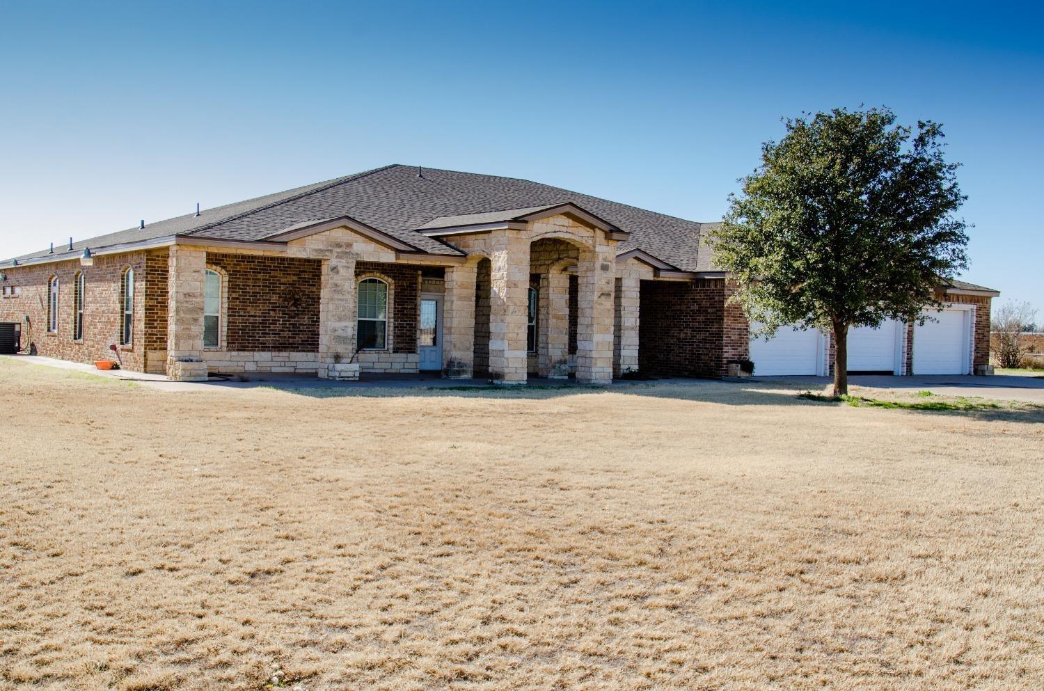 Plenty of room to roam. Located in Witharral ISD on 2.8 acres this beautiful 3br/4ba/3cargarage home with over 6000sq ft. The kitchen has beautiful custom cabinets, granite countertops, a Jennaire cooktop, and built-in double ovens. Two dining areas, one adjoins the kitchen, and one is in a separate dining room. There are two living areas with wood-burning fireplaces, Master suite has a separate bath and shower, and his and hers vanity sinks. Walk-in master closet with concealed private office behind closet cabinets with a passage door to the back patio. Bedroom #2 can be 2nd master with its private bath and walk-in closet. Large #3 bedroom also has a private bath and patio doors that look out to the backyard. Below are two basements for those stormy nights or overflow of guests. Oversize 3-car garage with freezer space, storage closet, and drop-down attic access. Sprinkler system, a water well, city water too, and a septic system. Small stalls for animals inside the pens,