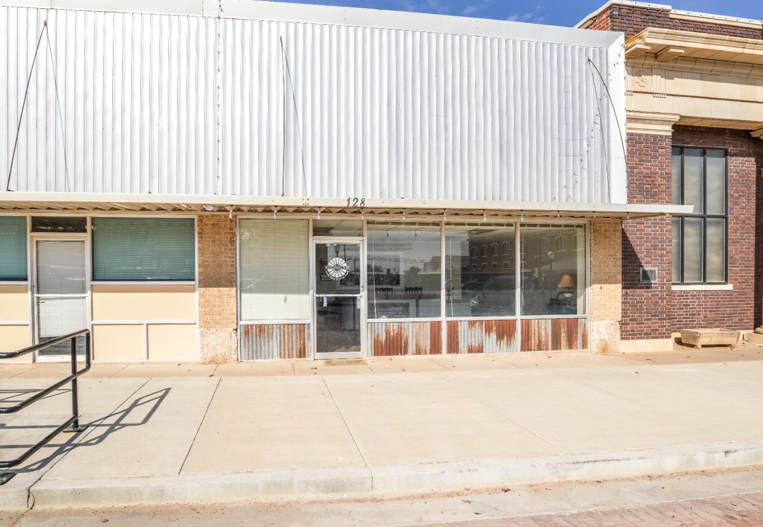 Let your creative mind go to work on this wonderful building located in historic downtown Post, Tx, just E. of Highway 84. Two large front retail areas with two large offices with warehouse or storage space. The warehouse/storage space has a large stainless steel sink, full bath with tub/shower combo and another half bath along with washer & dryer connections. Most recently used as part retail & part residential, offices are set up as living areas with kitchen setup in back warehouse space. A small yard just outside of back doors makes a great sitting area. This building could be used for many things from a professional office building to full retail or mixed commercial/residential.