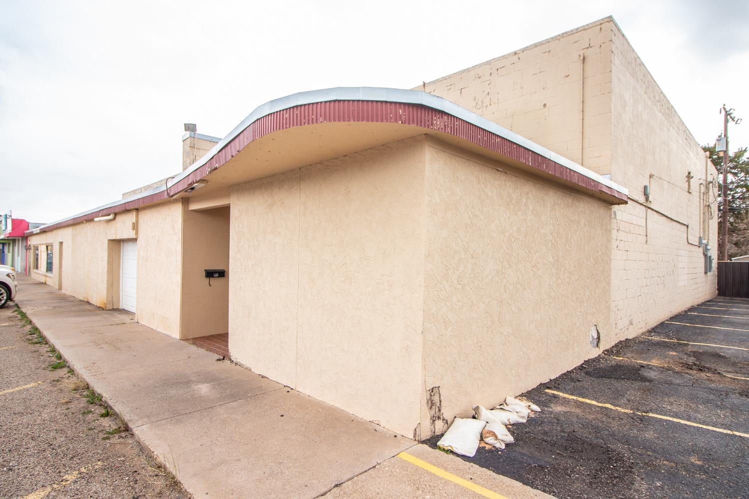 Amazing opportunity in central Lubbock located on the desirable and popular 34th St. This unique property offers technically 3 different addresses/spaces. Previous uses in this space was a retail store, storage, store, movie theater and a batting cage.