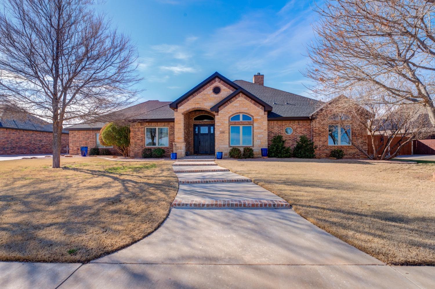 Fabulous 4/3/3 home on 1/2 acre lot in Fountain Hill Estates in Lubbock-Cooper ISD. As you enter this home, you will find fresh paint throughout, 12 foot ceilings, hard wood floors, a large kitchen featuring a bar area, granite countertops, a gas stove, and large pantry. The Master suite is isolated and features a walk in shower, granite countertops, and a large walk in closet with built ins. The other 3 bedrooms are a great size for children, guests, or even an office space. An extra feature is that the laundry room doubles as a safe room.  A wall of windows looks out onto the immaculate back yard and extended patio. This home also features a large bricked 30x40 workshop with built in work area and 16 foot doors to accommodate a large RV. This home has it all!
