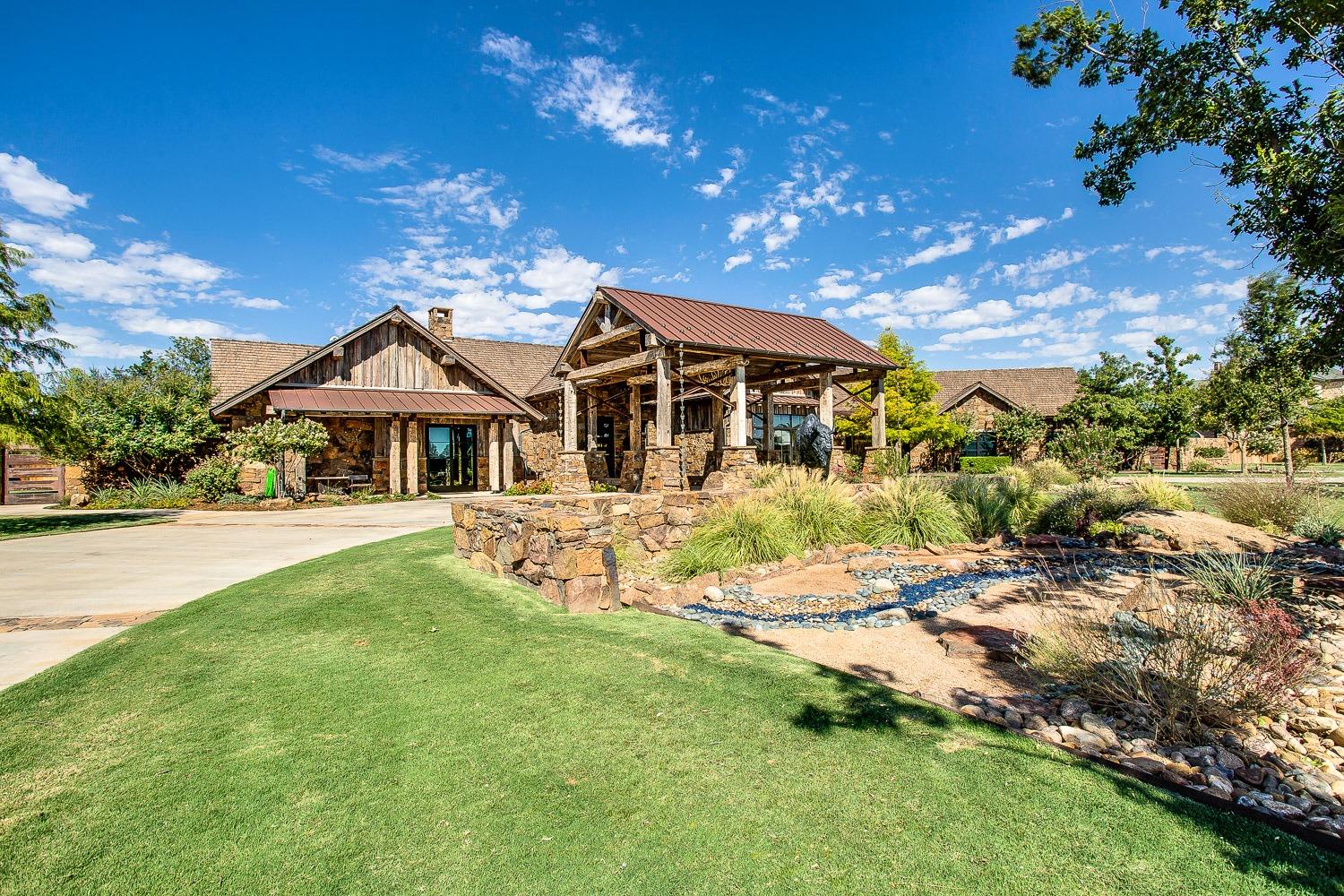 Step into your own rustic dream home, where the beauty of nature meets the epitome of luxury. This stunning 4-bedroom, 4-1/2 bathroom fully automated home with a POOL/POOL HOUSE is located in South Fork Ranch! The heart of the home is the gourmet kitchen, featuring a built-in fridge/freezer, double oven Italian range, ice maker, wine fridge, and a large pantry. The primary bedroom offers a spacious and tranquil escape with two large walk-in closets, and an en-suite bathroom with a steam shower and separate vanity spaces. Outside, the luxury continues with two spacious patios, outdoor kitchen, heated pool, and koi pond. The pool house is a retreat of its own, complete with a kitchen, bathroom, and a spacious living area, perfect for hosting gatherings. The main house and pool house each have their own 4 car garage/shop that is air conditioned. Your dream home awaits. Don't miss out on the opportunity to make this house your home, call to schedule your showing today!