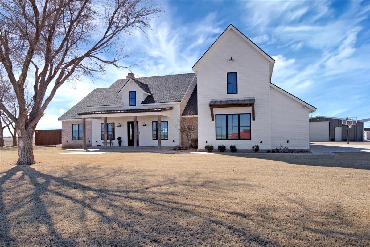Country Luxury! Total livable square footage is 4744 including the separate barndominium! Step into one of the most unique pieces of property in Lubbock, TX. This home offers tons of bonus features, and room to play on the 7 acres it comes on (up to 39 additional acres can be included). The primary home boasts 4 bedrooms, 3 full bathrooms, and a 3 car garage. Inside you are greeted with tall ceilings, special high end finishes, granite countertops, and great layout. The backyard has a brand new extra large swimming pool with remote cover. The barndominium on the property is fully livable, with 2 bedrooms, 2.5 bathrooms, and full kitchen. Also has a large storage room attached. In the back there is a fully functioning animal barn, with pens. And an additional shop is located in the very back of the property, 30x120 feet! This property has a lot of extras, and is a must see.