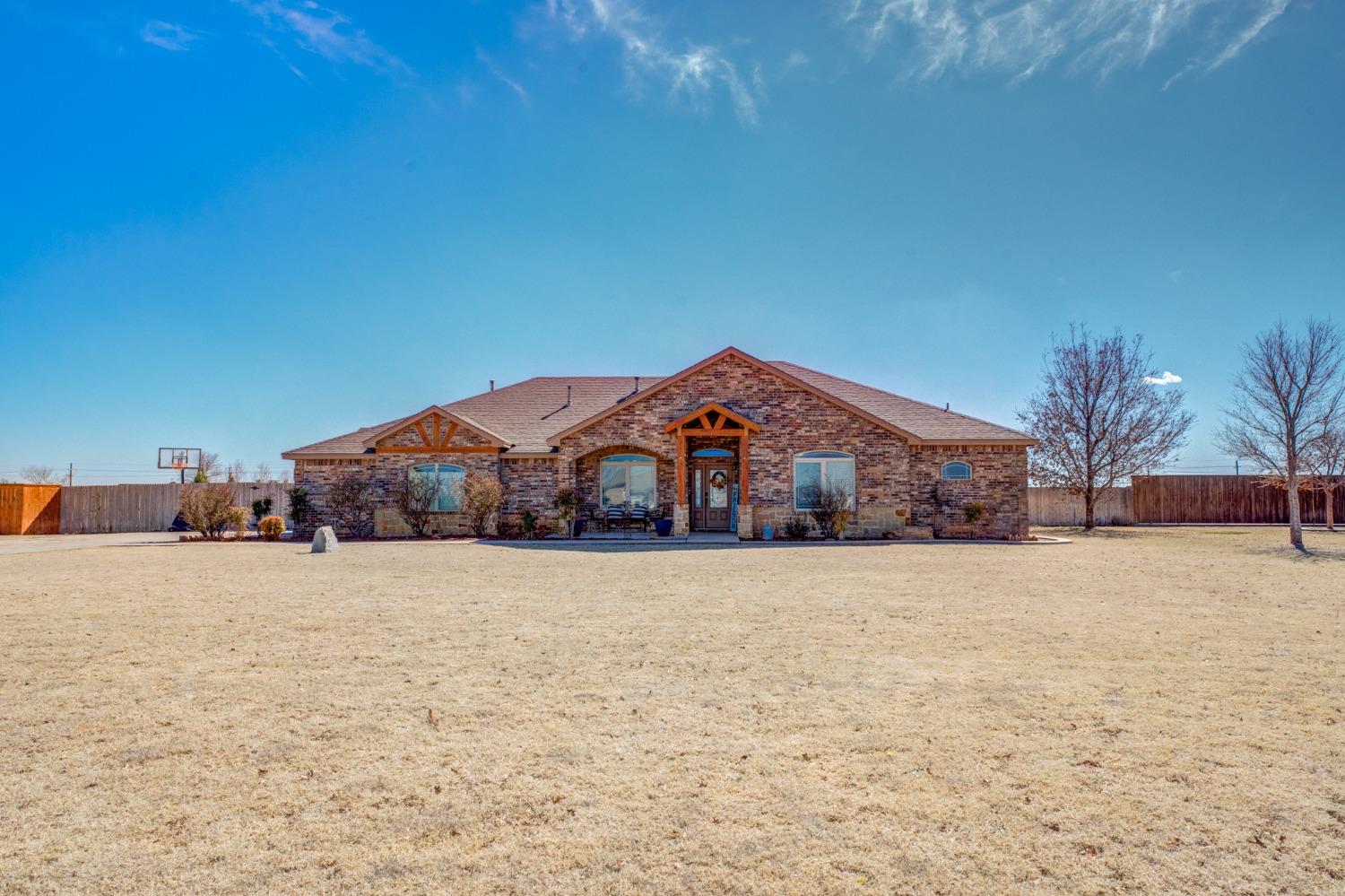 Don't miss this 4/4/2 home with an office AND bonus room that sits on an acre of land in the sought after neighborhood of Cooper Ranch in Lubbock-Cooper ISD! The living room flows perfectly into the kitchen area with a breakfast bar and island space.  The master bathroom features a relaxing Jacuzzi soak tub, separate vanities and a large closet with plenty of storage space. Don't miss the large laundry room and mud room conveniently located right by the garage. With ample space in the backyard, you'll find this to be the perfect place for kids or pets to play!