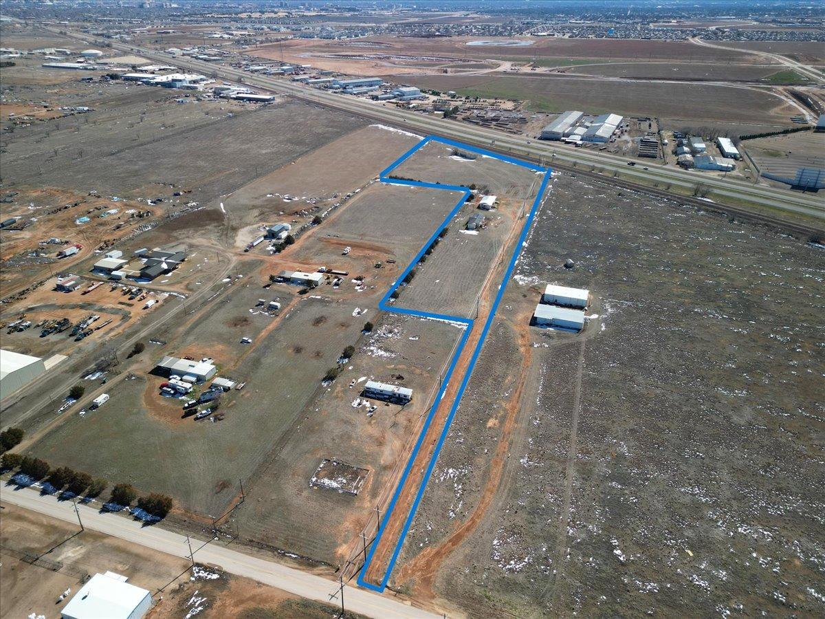 This is 3 properties totaling 8 acres with 3 structures.  This unique property lends itself to an abundance of uses and opportunities. Located off Clovis Hwy with Frontage visibility, minutes from Shallowater with no restrictions. There are 3 duplexes that can be finished out as rental properties or nightly rentals with room for additional dwellings for added revenue.  They were multi-family at one point. Approximate square footage is over 6,000 square feet per LCAD.